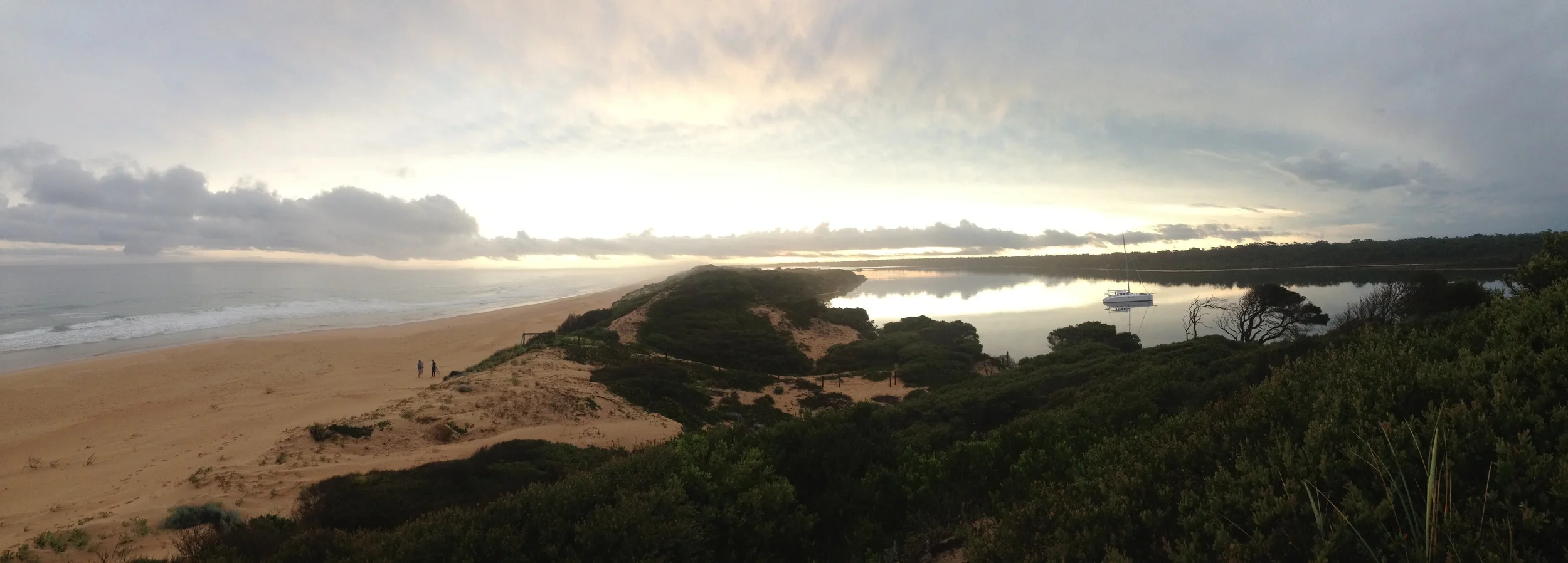 John, Lois and Andy on ninety mile beach and Roam in the calm evening waters of the Bunga Arm Gippsland Lakes.