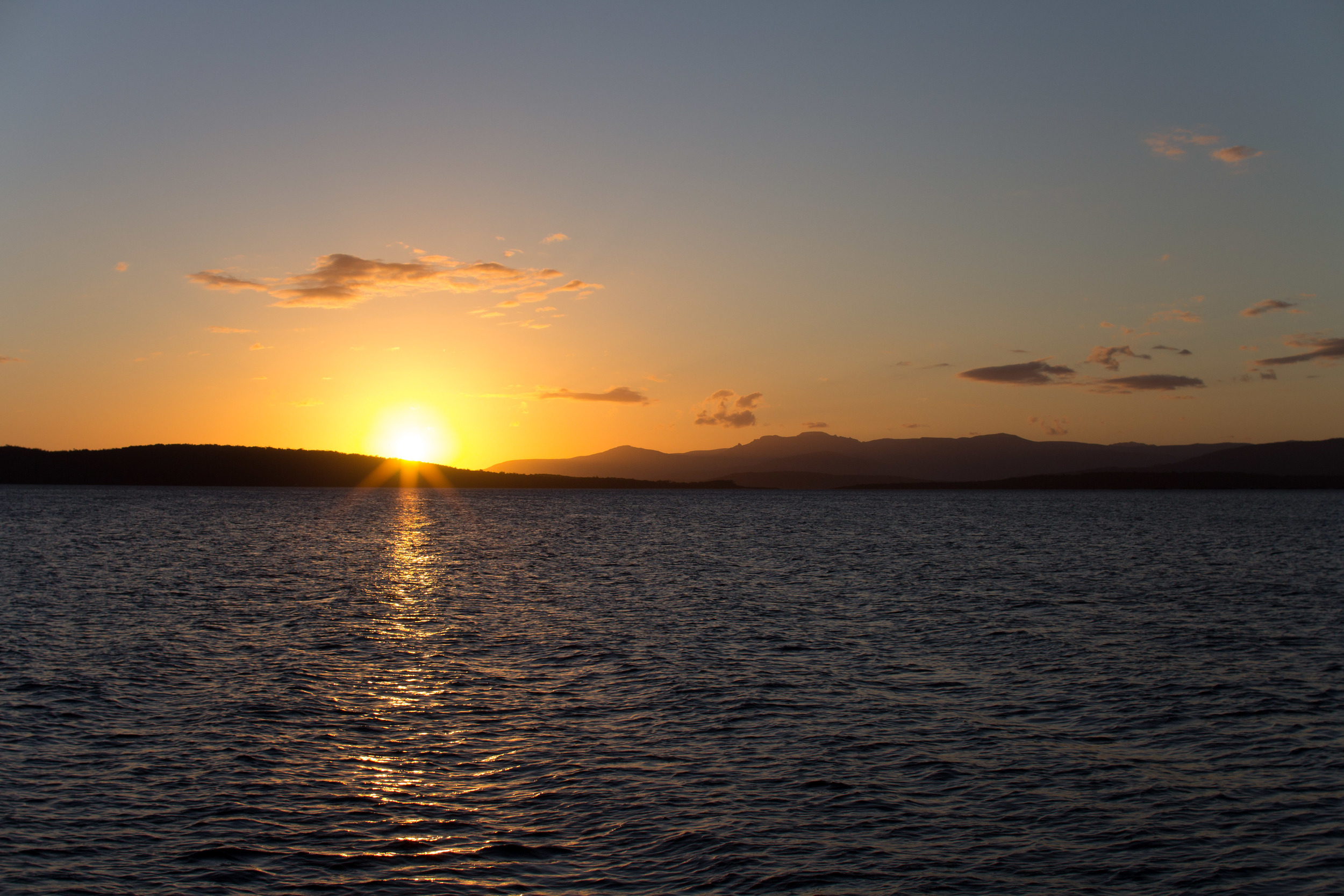 Sunset over Southport from Bruny Island.