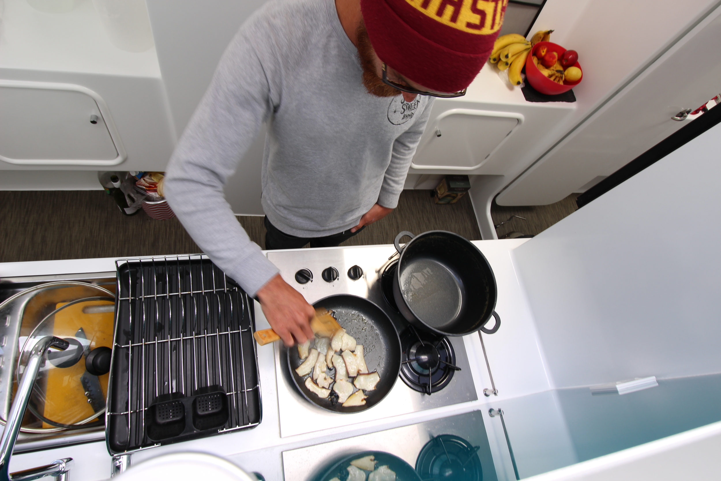 Andy cooking up some abalone for lunch.