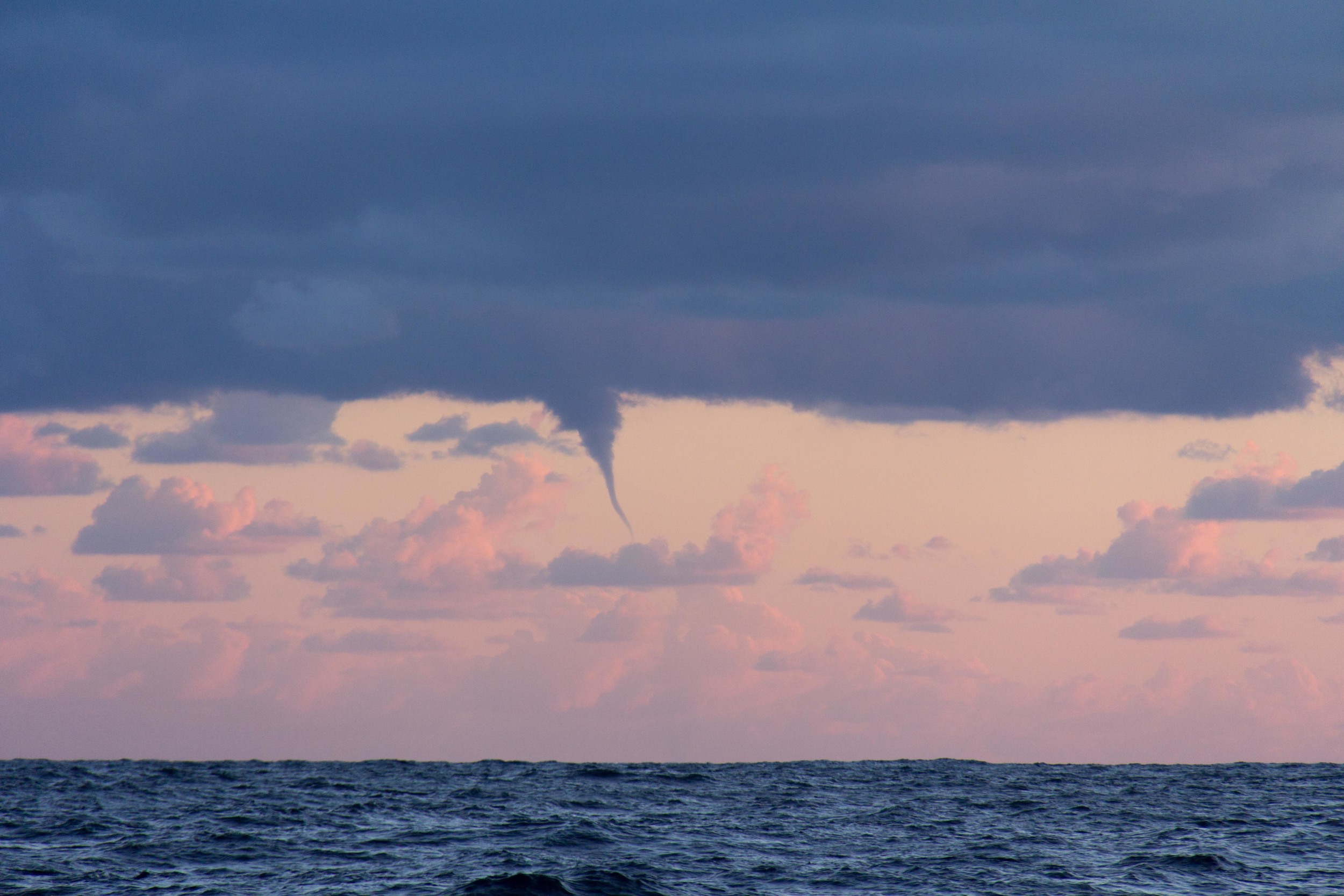 A water spout forming in a rain cloud behind us. It looked a little worrying but did not proceed to grow any bigger and disapeared.
