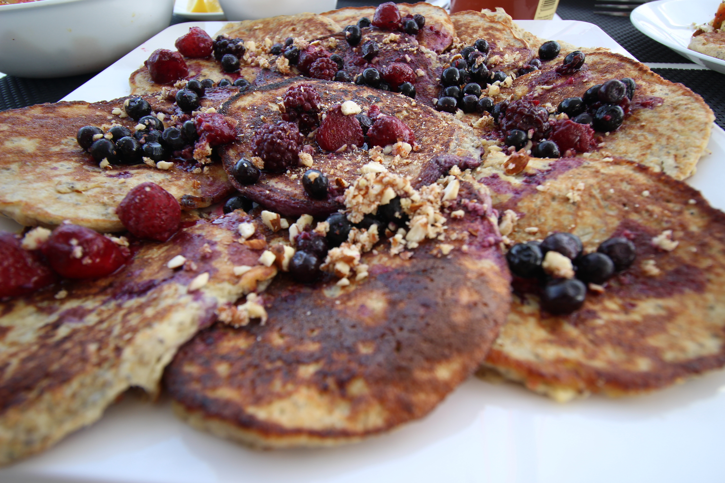 Banana and coconut pancakes we enjoyed with banana ice cream berries, fresh orange juice and fruit salad in an attempt to eat as much of our left over fruit as we could so it didn't go to waste. 