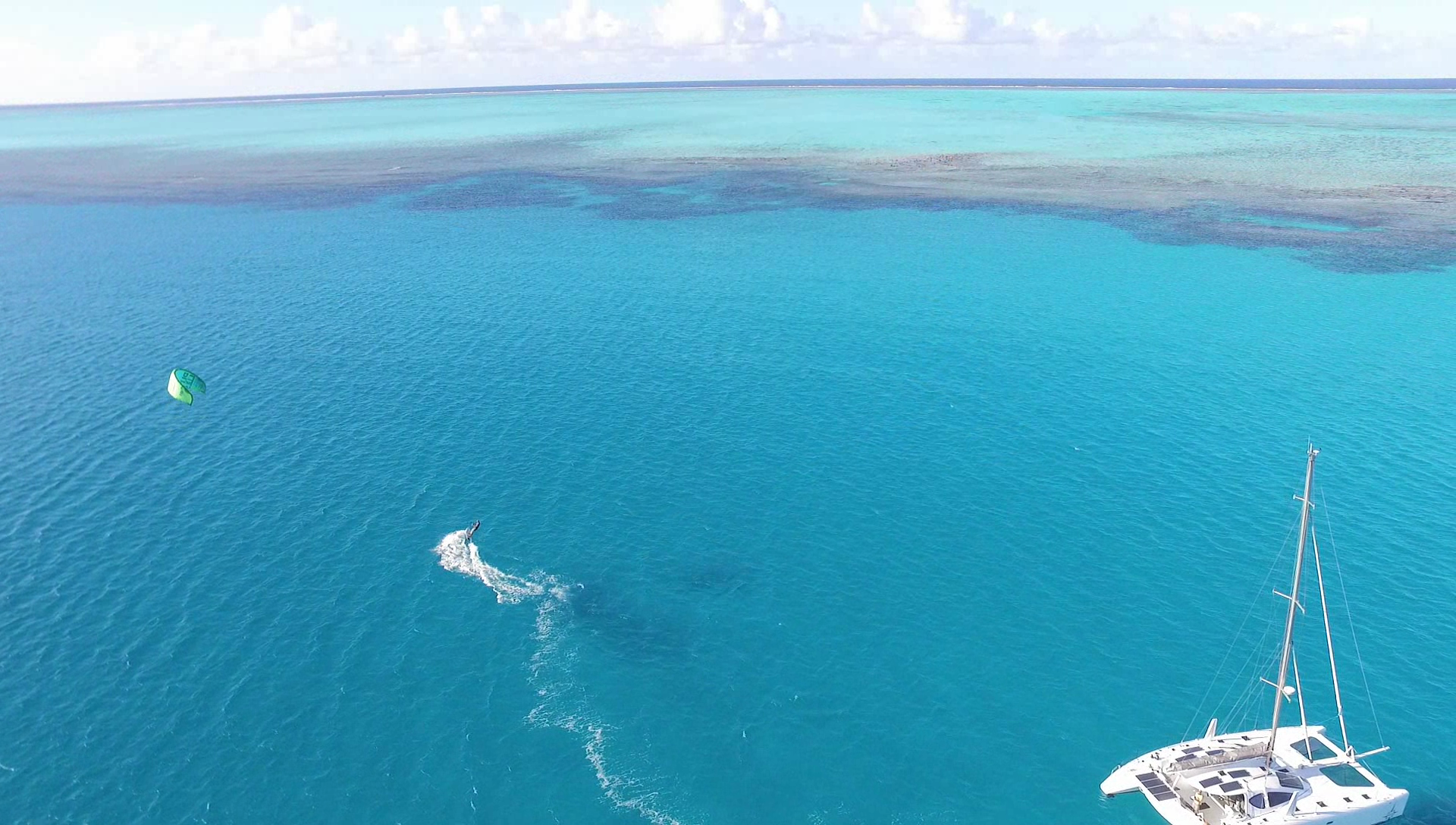 Iain kite boarding over to get a closer look at the reef.