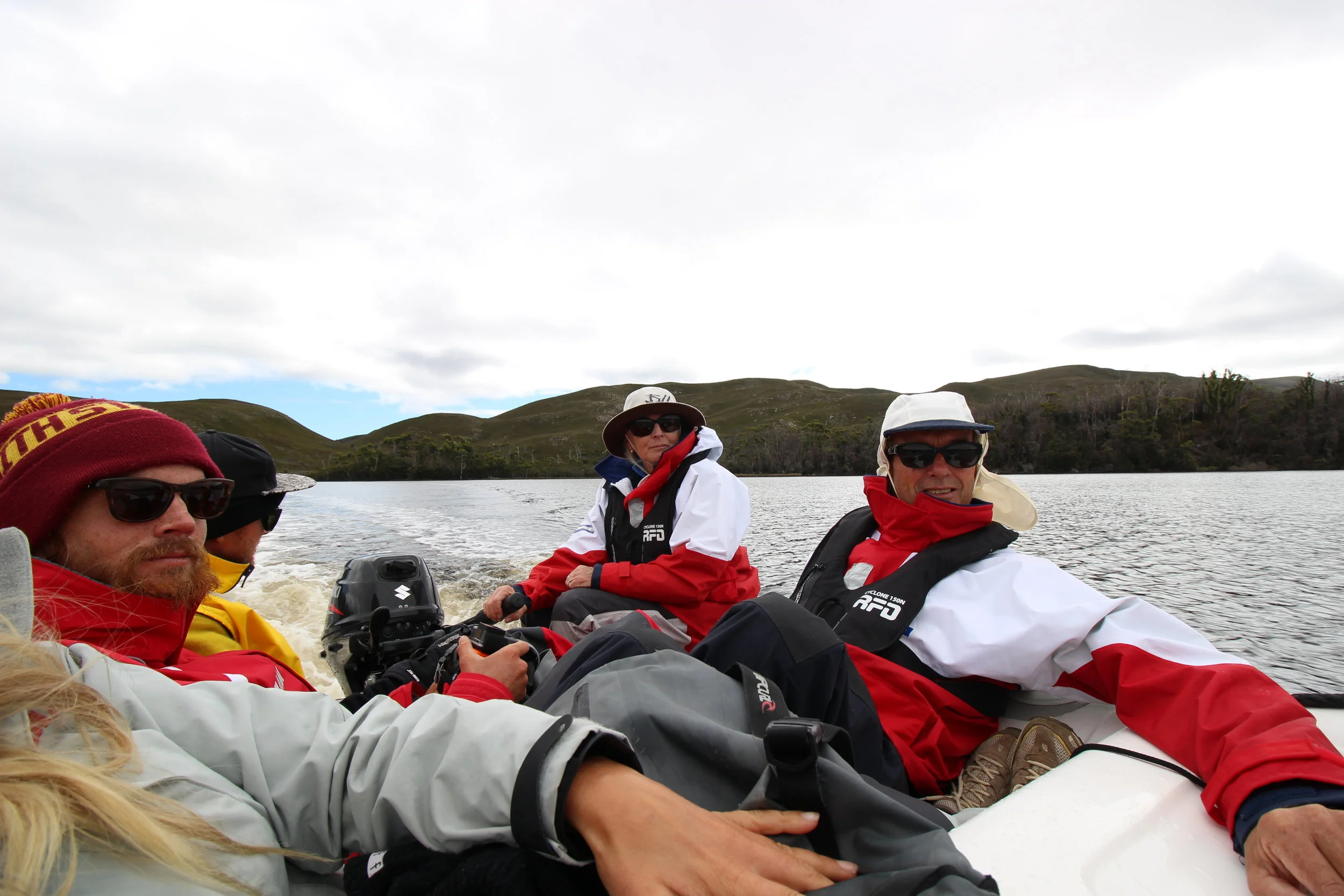 A fully loaded, cosy dingy ride up the Davey river with captain Lois driving.