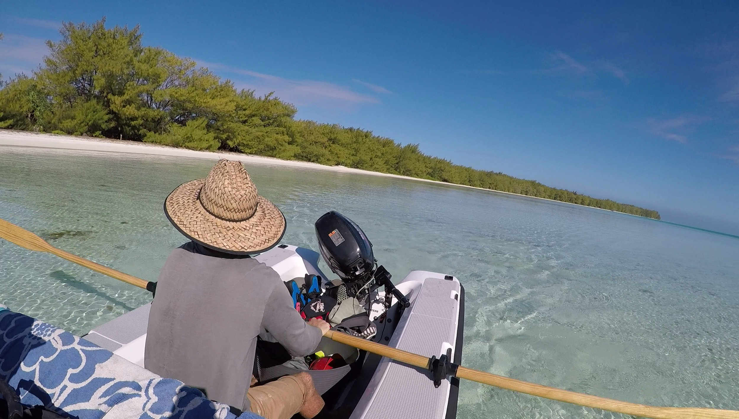  Rowing Kopiko around the Motu on a beautifully calm day. Trying to minimize our outboard use 