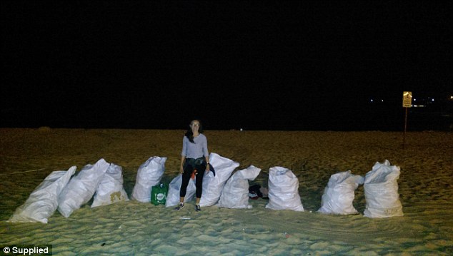 Me at 2am on Coogee Beach, after a mega Christmas Party Rave left over 30,000 bottles on the beach (my estimate).