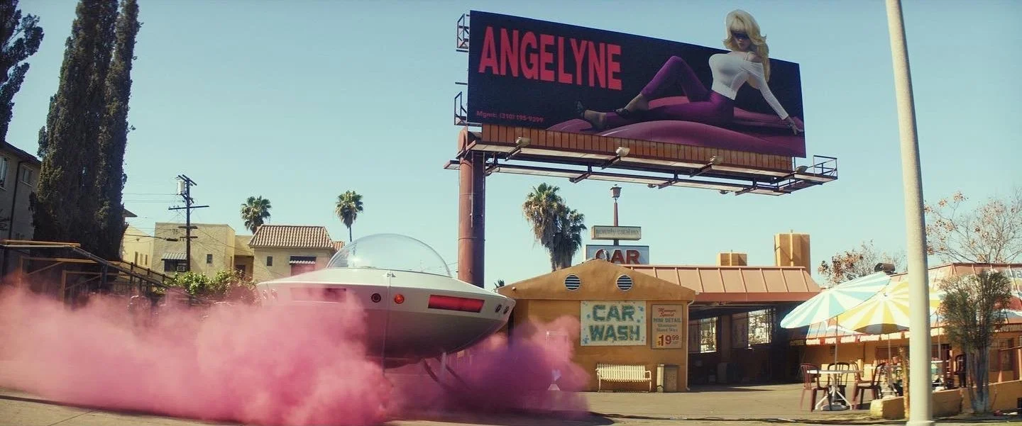 angelyne-flying saucer-pink smoke-billboard.jpg