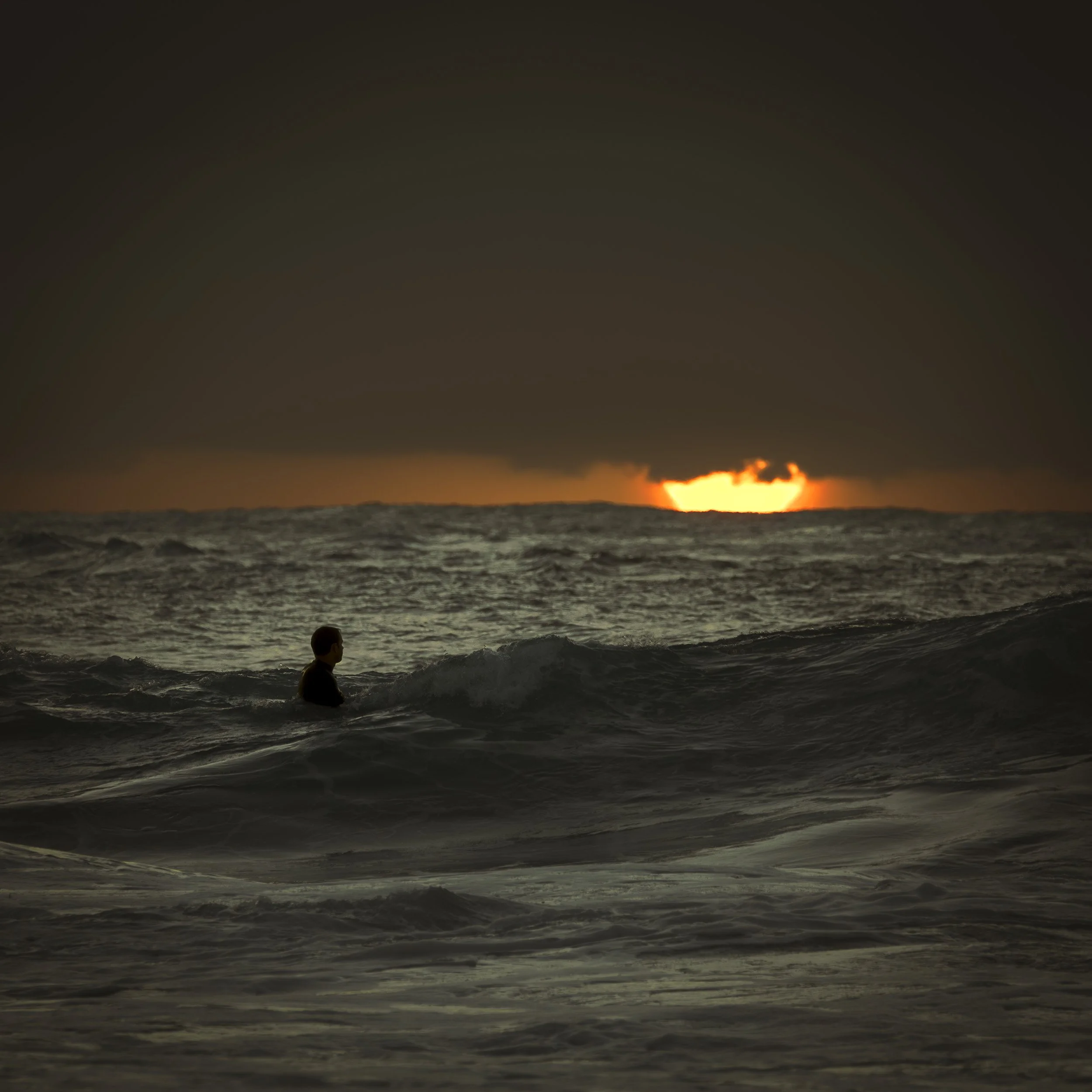 Sunrise beneath the clouds at Coogee Beach