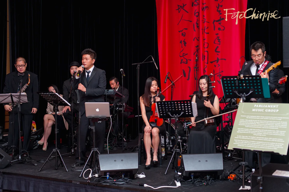 In the Marketplace: Parliament Music Group performs for a beautiful crowd. Photo by Krista Fox Photography.