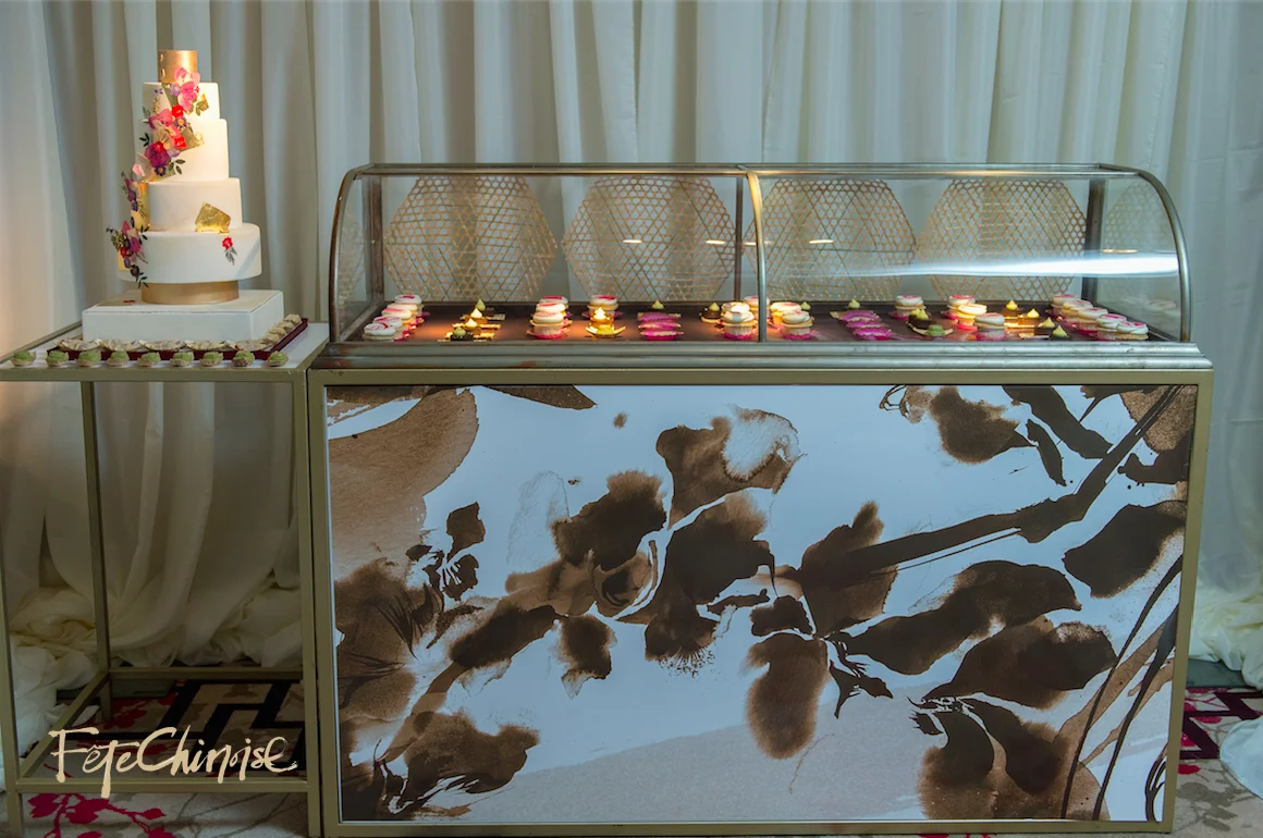 The Dai Pai Dong: Decor by nous design group. Cake display by The Wedding Cake Shoppe ; Custom design/graphic by Palettera Custom Correspondence and vinyl printed by Event Graffiti . Photo by Krista Fox Photography. 