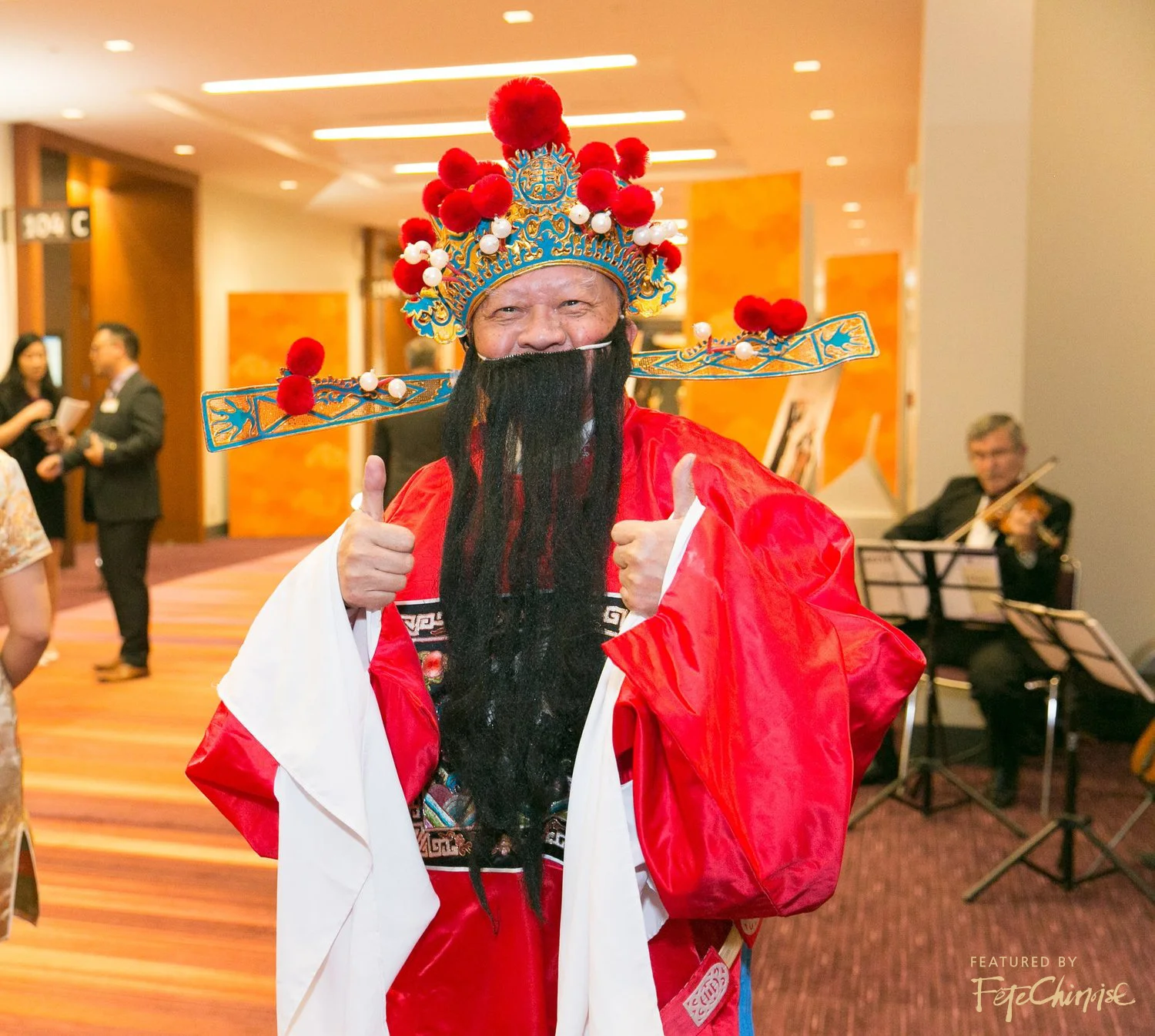 Allen Leung dressed as the God of Prosperity