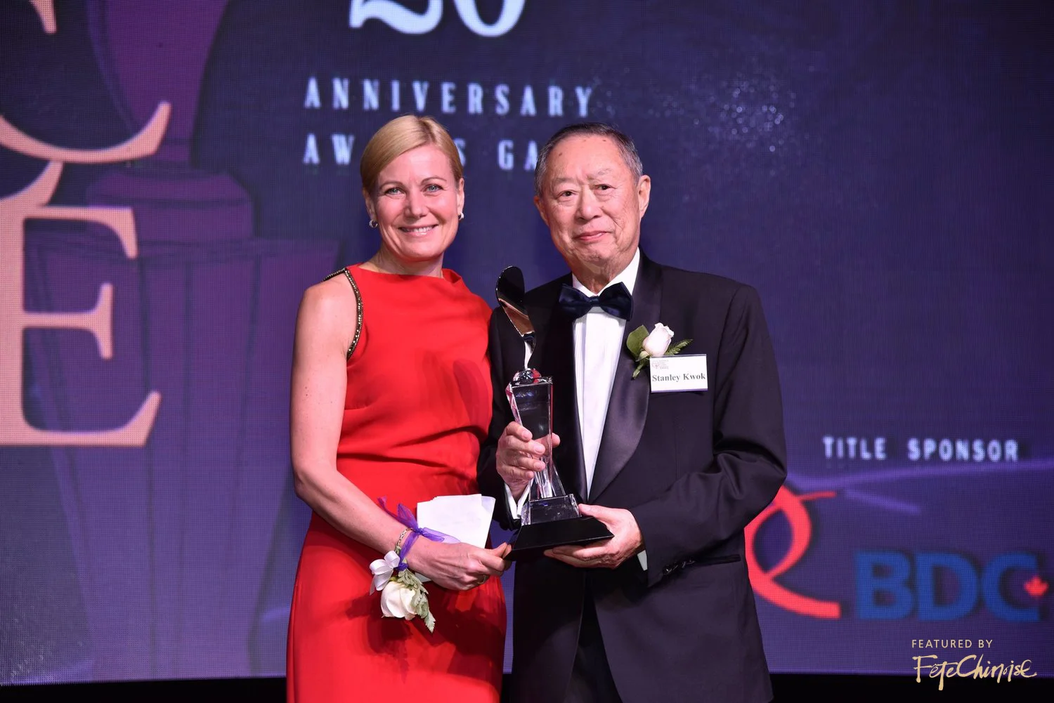Kim Mason, Regional President of Greater Toronto Region at RBC presents Lifetime Achievement Award to Stanley Kwok