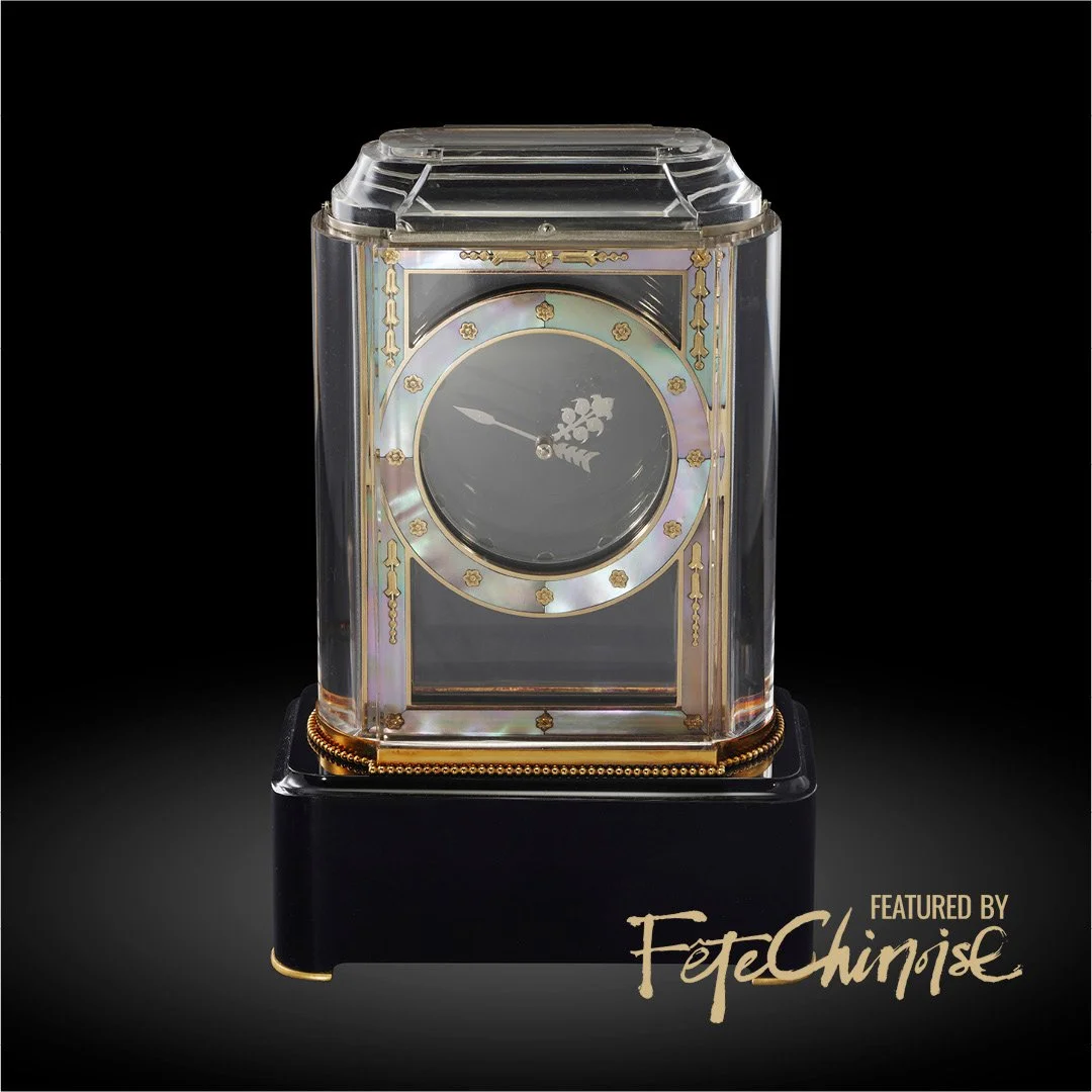 A unique, extremely rare, and historically important rock crystal, mother-ofpearl, yellow gold, onyx, and diamond-set Art Deco mystery clock, circa 1925