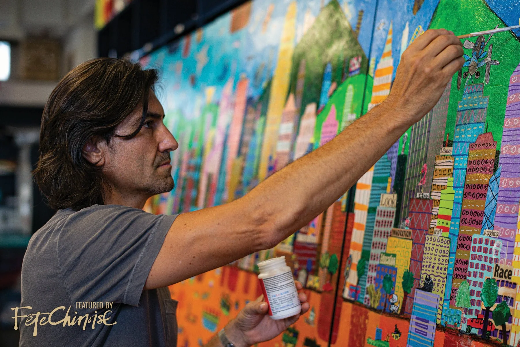 Francesco Lietti painting Under the Lion's Gaze. Photography: Thien-Ty Ly.