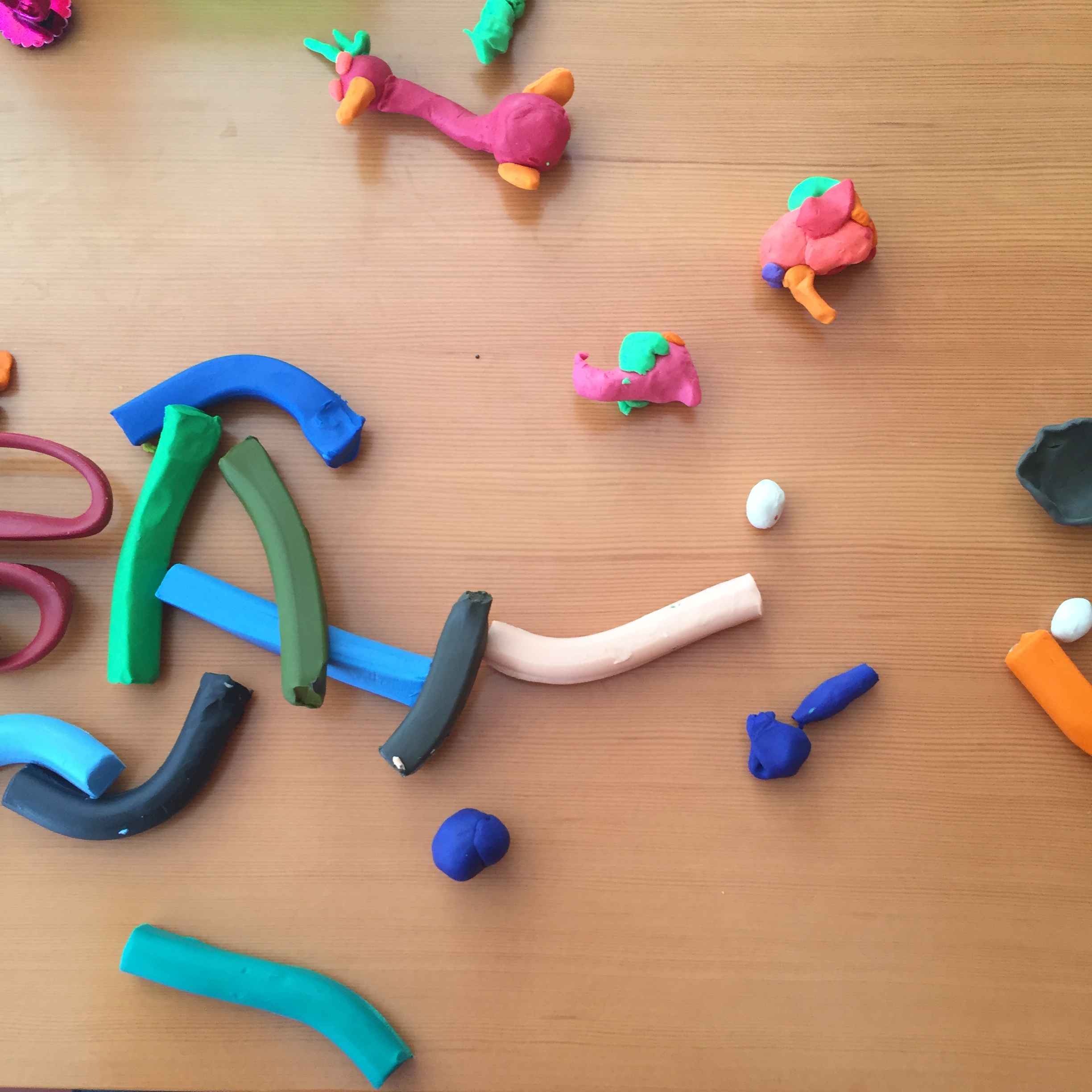 Playing with clay.