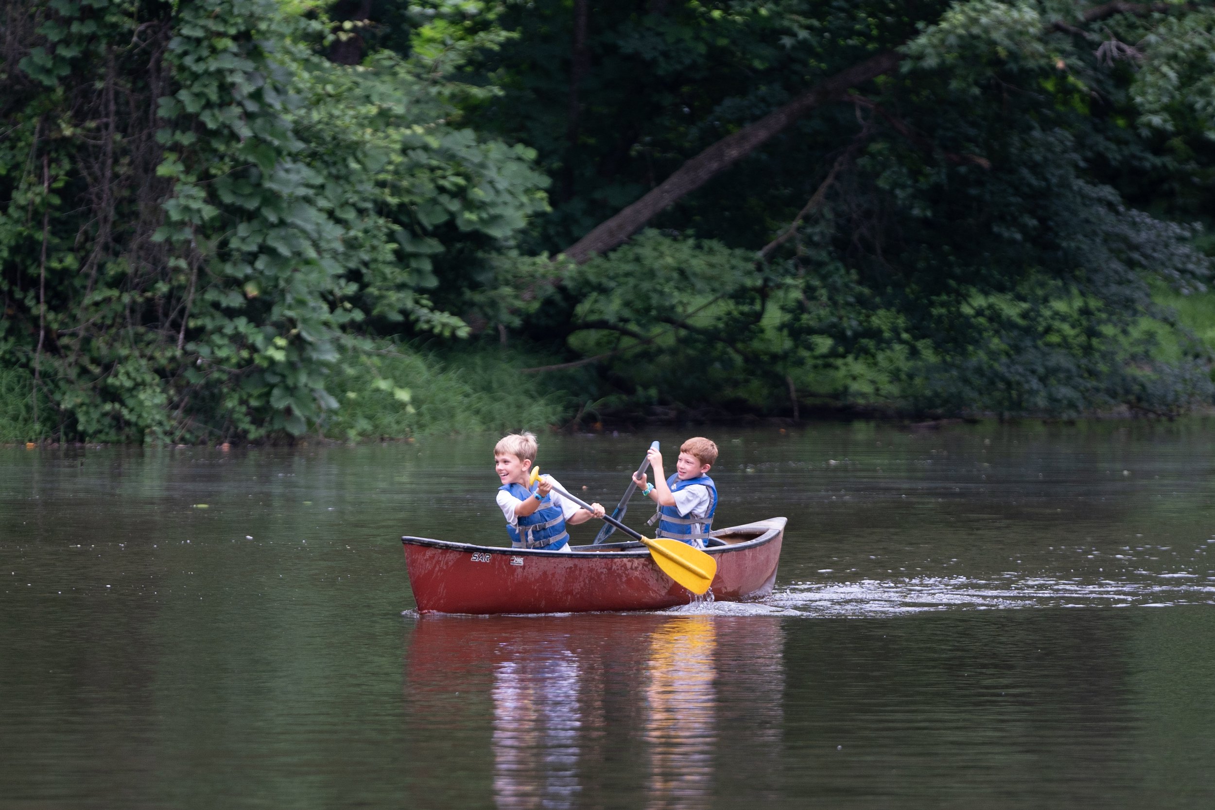 Summer Break Camp Image of kids canoeing