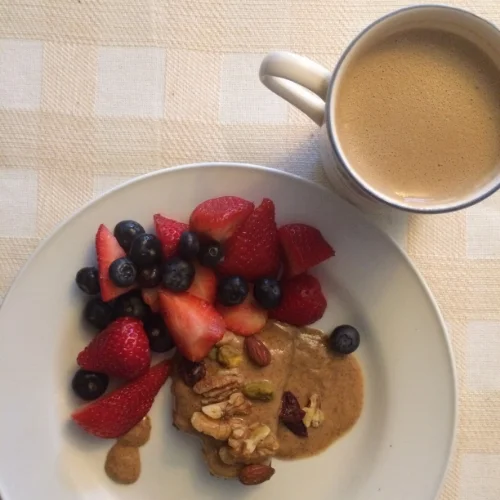 My breakfast "sugar fix" on the Whole30: Fruit, Omega3 Trail Mix, Almond Butter, over Coconut RX Bar and bullet-proof coffee, blended with cinnamon, ghee and coconut oil. 
