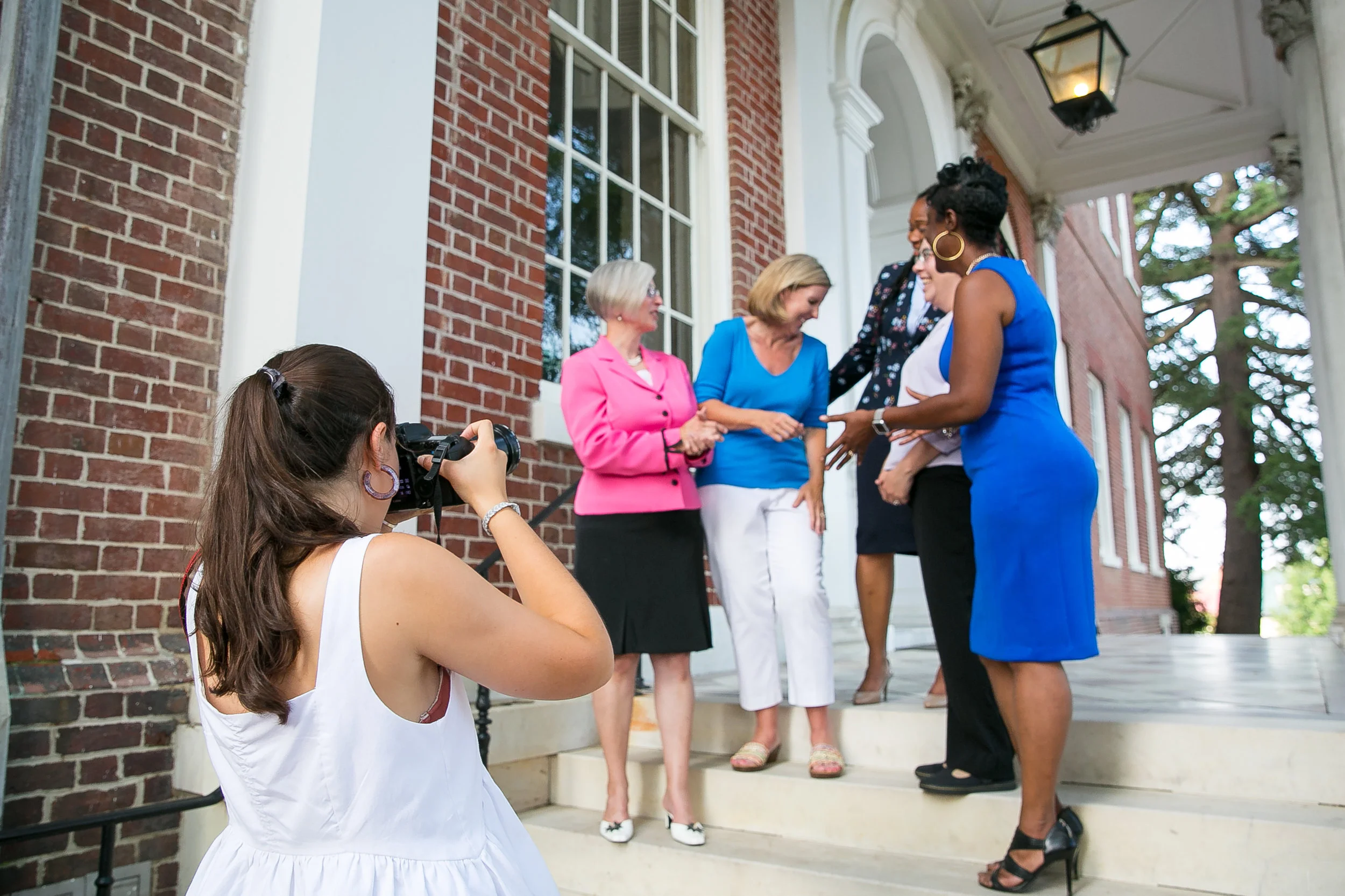 Sophie photographing candidates for Board of Education. Photo: Raba Abro