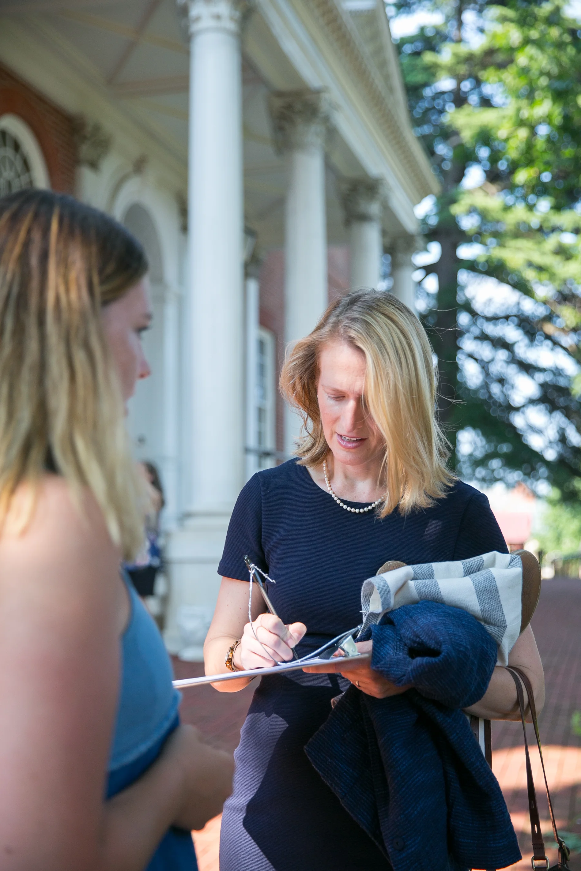 Del. Brooke Lierman signing into the event after canvassing for another friend running for office Photo: Raba Abro
