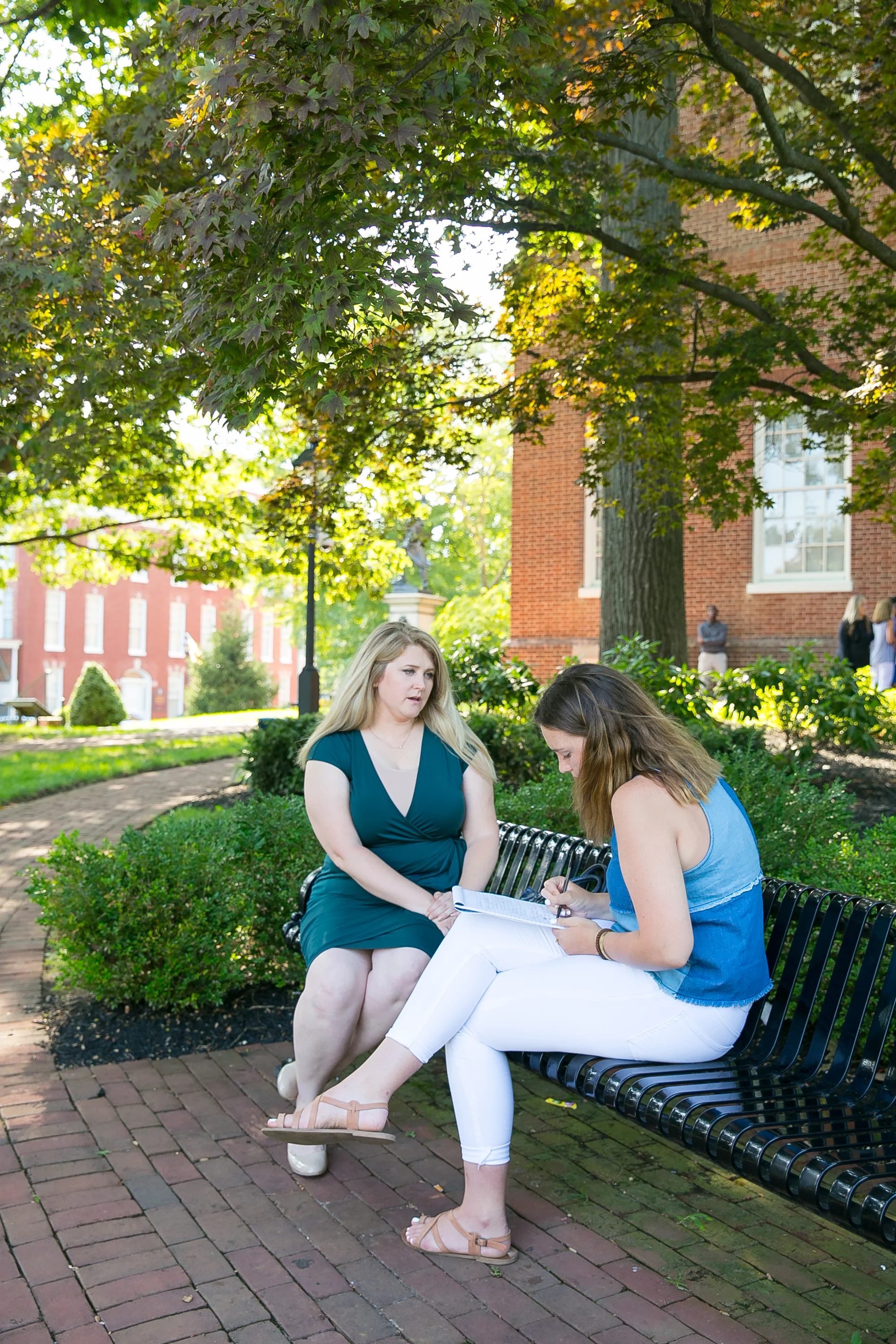 Lesley Lopez being interviewed on the State House Lawn Photo: Raba Abro