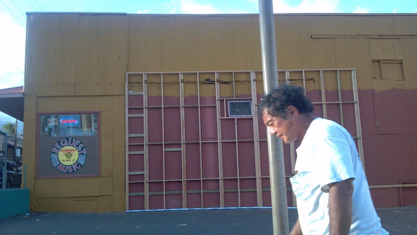 A separate wall had to be added to the corrugated siding before I could begin. Once again through the generosity of others, led by Lesley Oshiro, this was able to happen in a day. 
