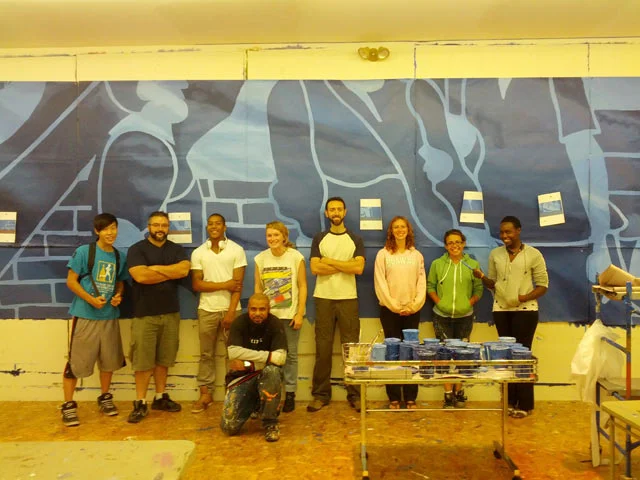 I had assembled a fantastic mural and mosaic team during the summer to complete this work. I moved my studio into Mural Arts Tour Office in the Gallery in Market East, and we began prepping for a summer of glass cutting and volunteer paint days. 