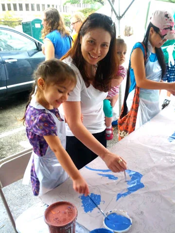 People brought their families, there was food and music. The event was a huge success in spite of the weather. 