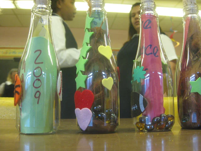 There were stations with plastic bottles for more writing as well as decorating. These bottles came in to play at the dedication. 