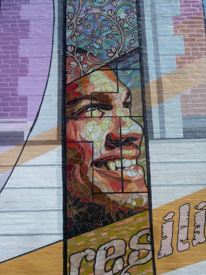 He trained and became a professional boxer as an adult, a serendipitous coincidence as the mural faces the site of Joe Frazier's famous gym.