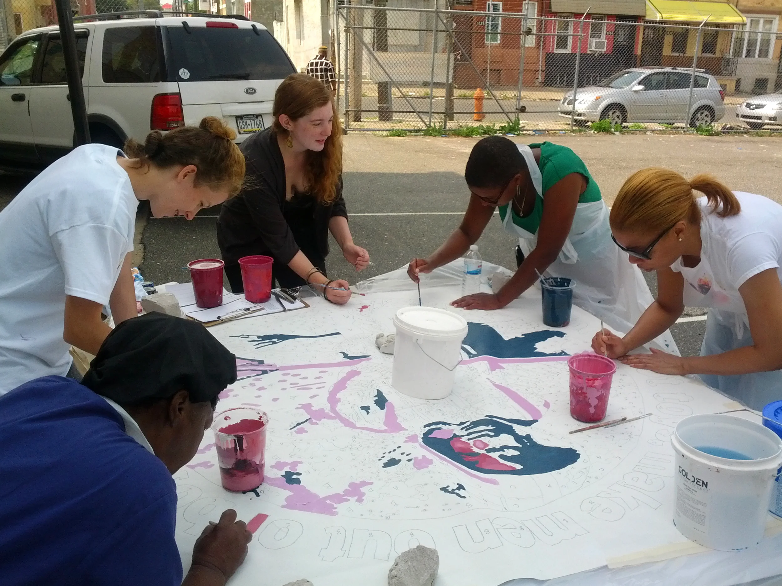 We held one final community paint day in late July. This was to create some additional imagery that was specifically meaningful to the community surrounding the mural. Its a challenging task to develop a mural's concept and design with certain stakeholders, and then find a host community outside of those stakeholders who is willing to have the project. 