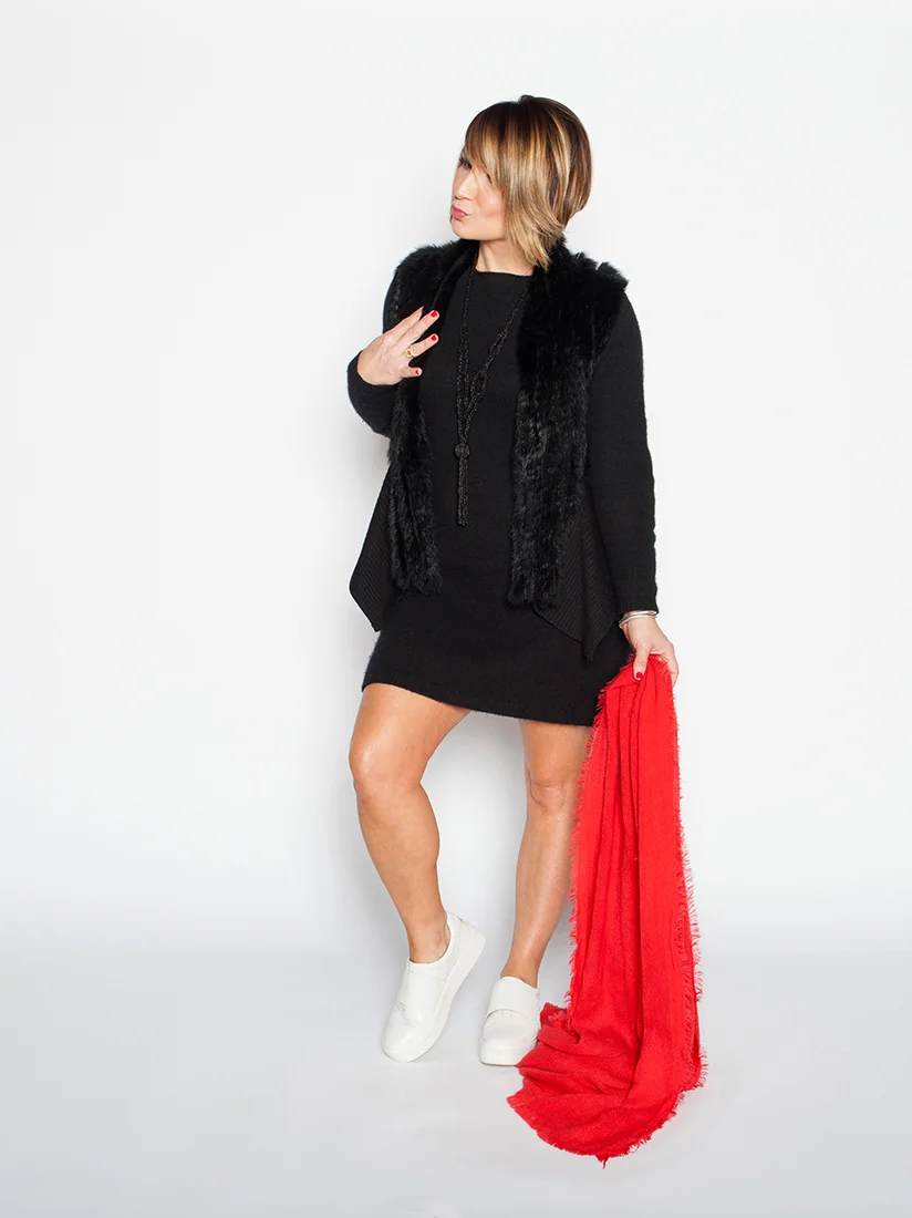 Key Holiday Accessories: Red scarf, white platform sneakers