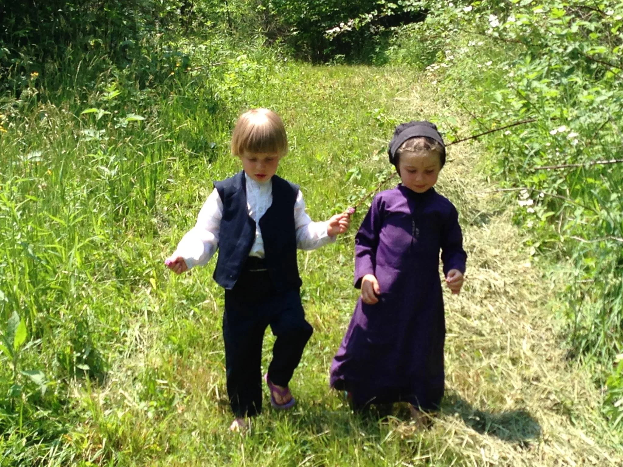 Walking through the woods at West Salem Amish Mission