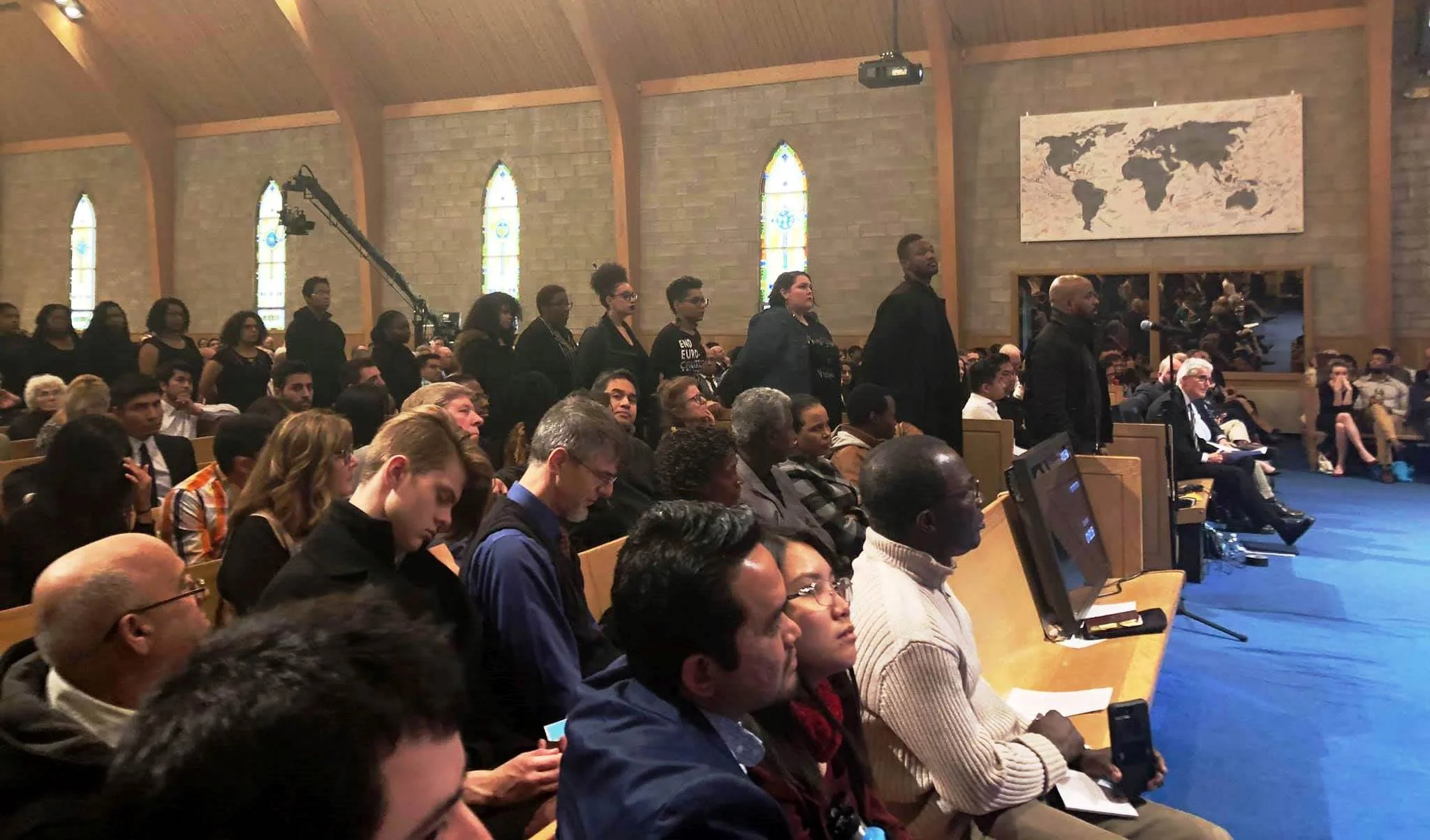 A group of black justice Adventists, trying to intimidate Elder Ted Wilson at Pioneer Memorial Church on March 2, 2019.
