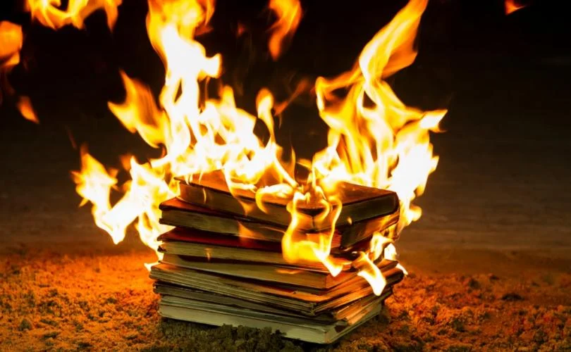 burning_book_pile_810_500_75_s_c1.jpg