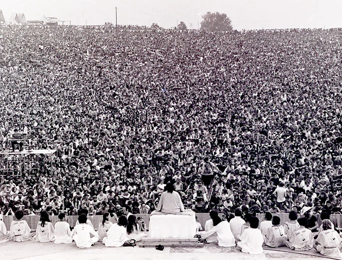 Swami Satchidananda gives the “invocation.”