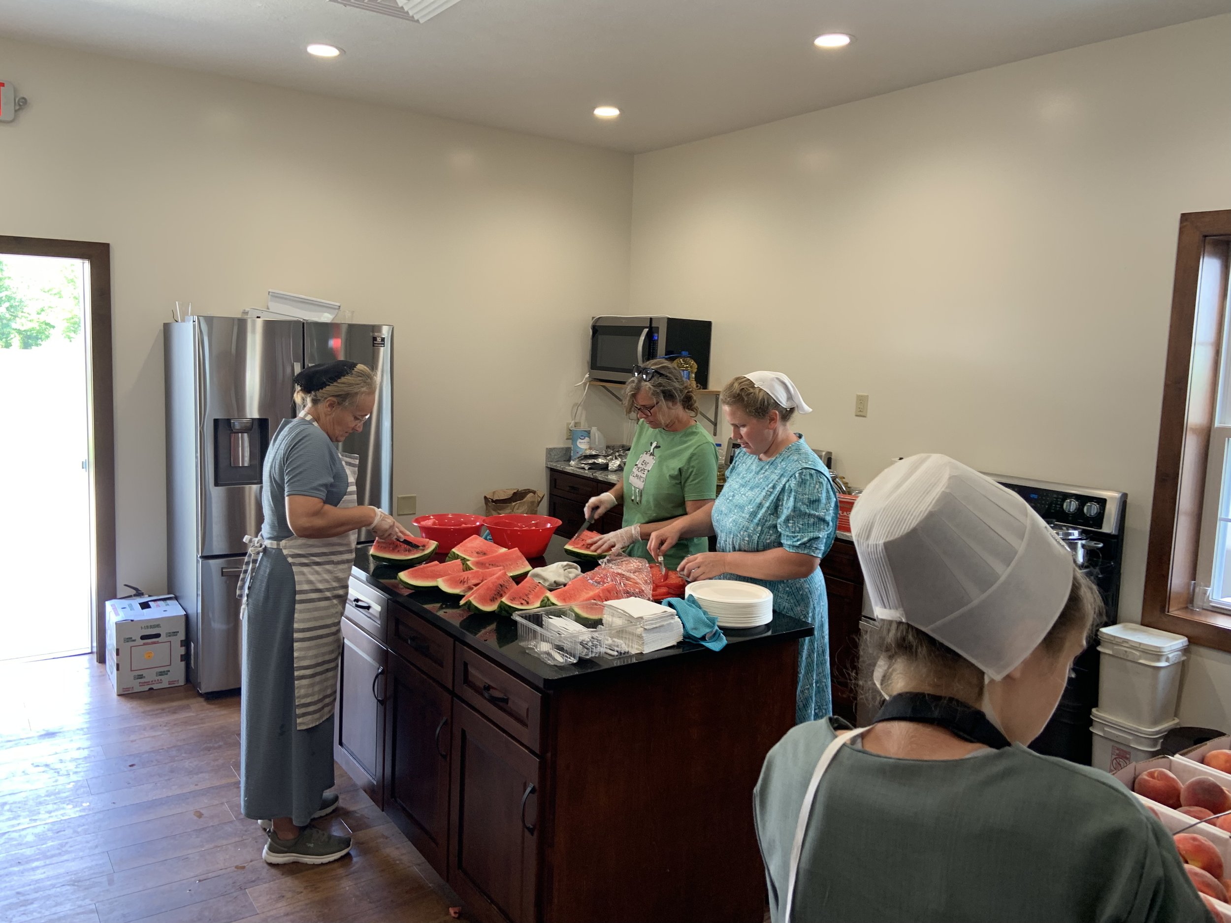 Ladies serving in the kitchen