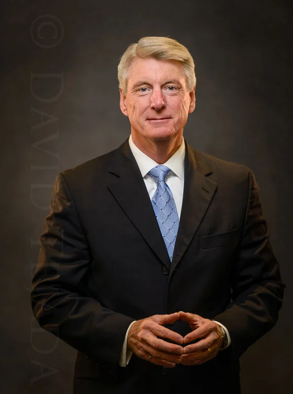 David has a unique ability to put his subjects at ease. He shoots corporate headshots , executive portraits as well as environmental portraits for all sorts of business. Whether it's a simple executive portrait or a production nightmare, David will handle the project details and coordination in a professional manner within your budget. Located in near Denver, Colorado, David photographs portraits all along the front range. He has photographed for all sorts of industry leaders representing the mining , engineering , energy , and healthcare industries. His rates are very competitive and he is easy to work with. He shoots each assignment thoroughly, from a variety of angles and perspectives, which provides you or your client plenty of choices. David shoots both domestic and international assignments, combining a thoughtful approach incorporating elegant lighting with a strong sense of design. He approaches each assignment with a CAN DO attitude, with the intent of producing award winning work that both client and designer would be proud to display. He is also an effective communicator, comfortable with all employees from management to support field staff, and sensitive to the political and inter-personal issues at work. David treats each assignment as an editorial essay, stressing strong, compelling images that communicate the story. Finally, he is an excellent problem solver, adapting quickly to changing conditions and technical challenges, remaining focused on the assignment goals while adhering to practical time and financial constraints.
