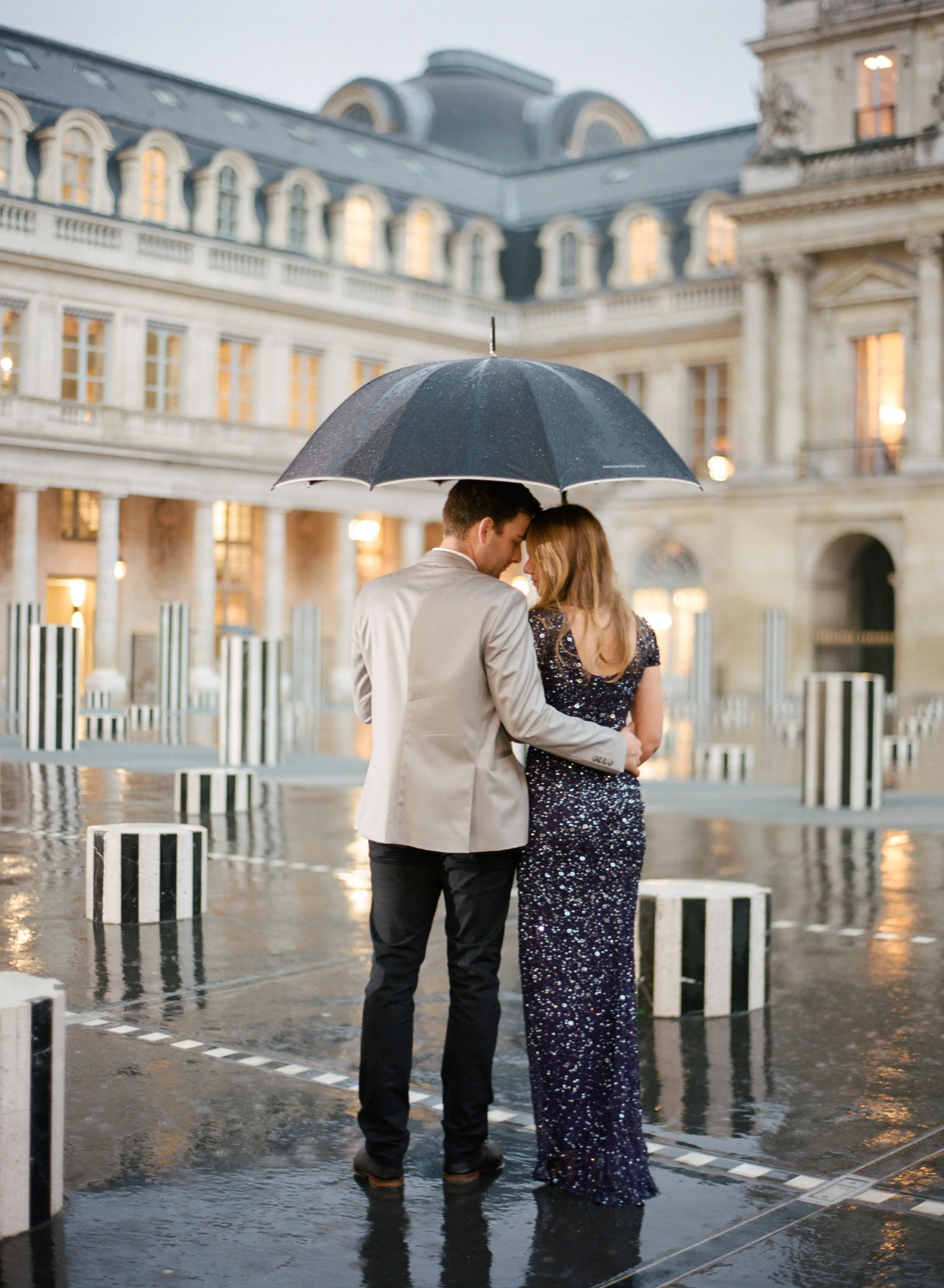 The next image is one that was taken in Paris, for an engagement session. It ended up pouring that day, but we made the best of it—and I love this intimate moment that I was able to capture of Marieke and Jasper huddled under the same umbrella.