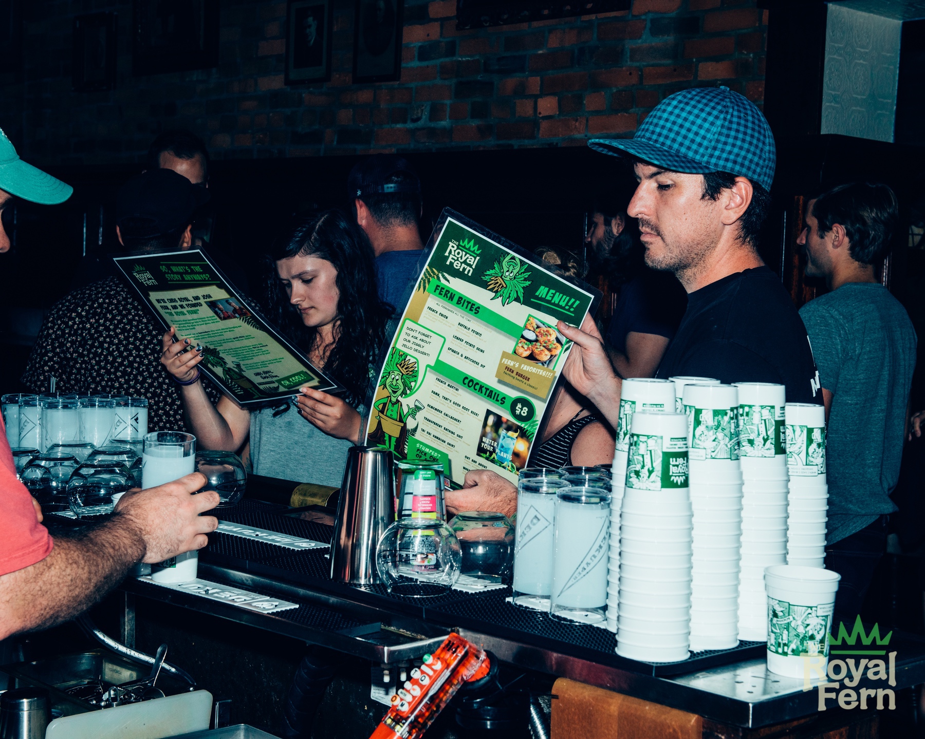 Complete with custom souvenir cups and oversized menus