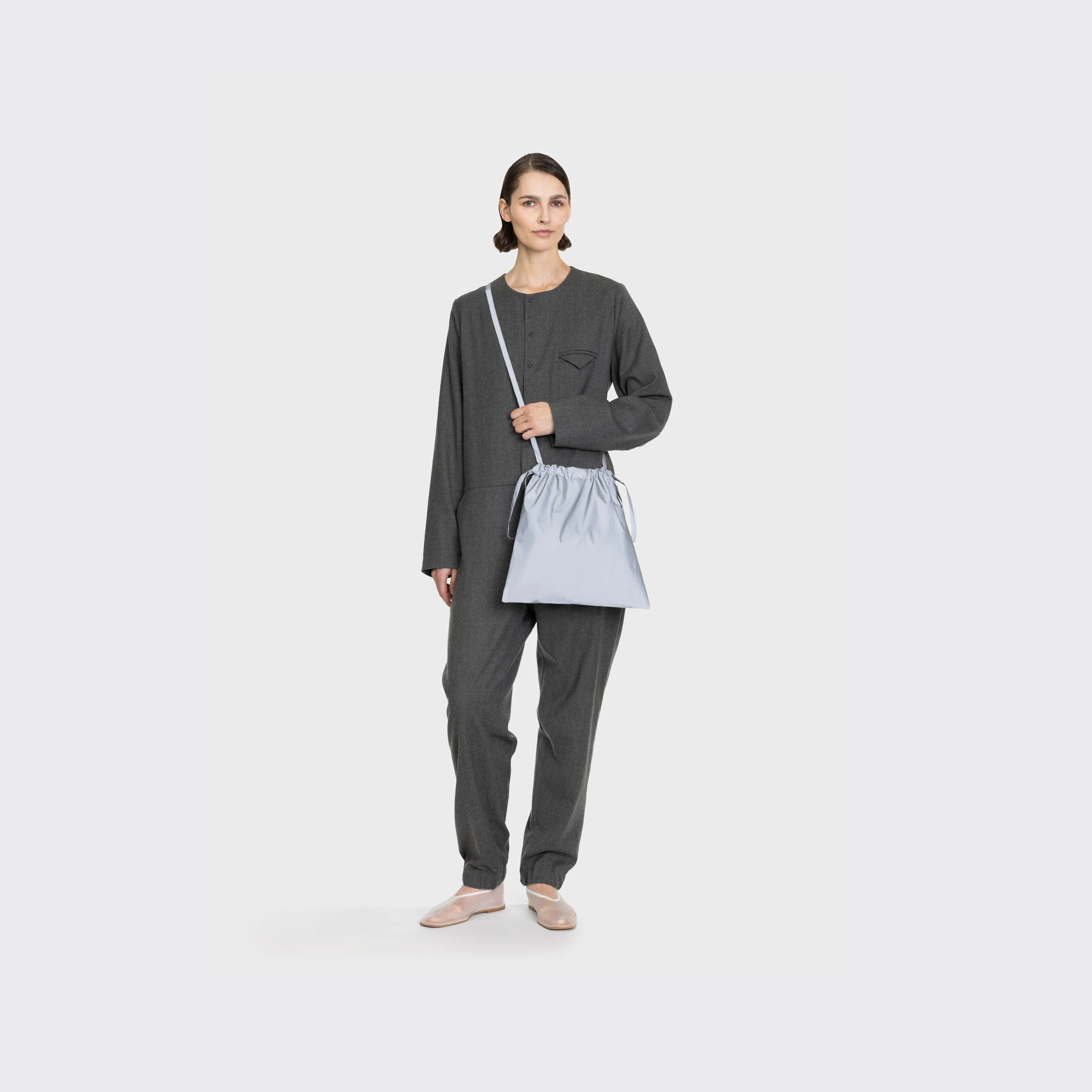 35w 1formuniform_drawstring_bag+w+strap_35_folio+copy.jpg