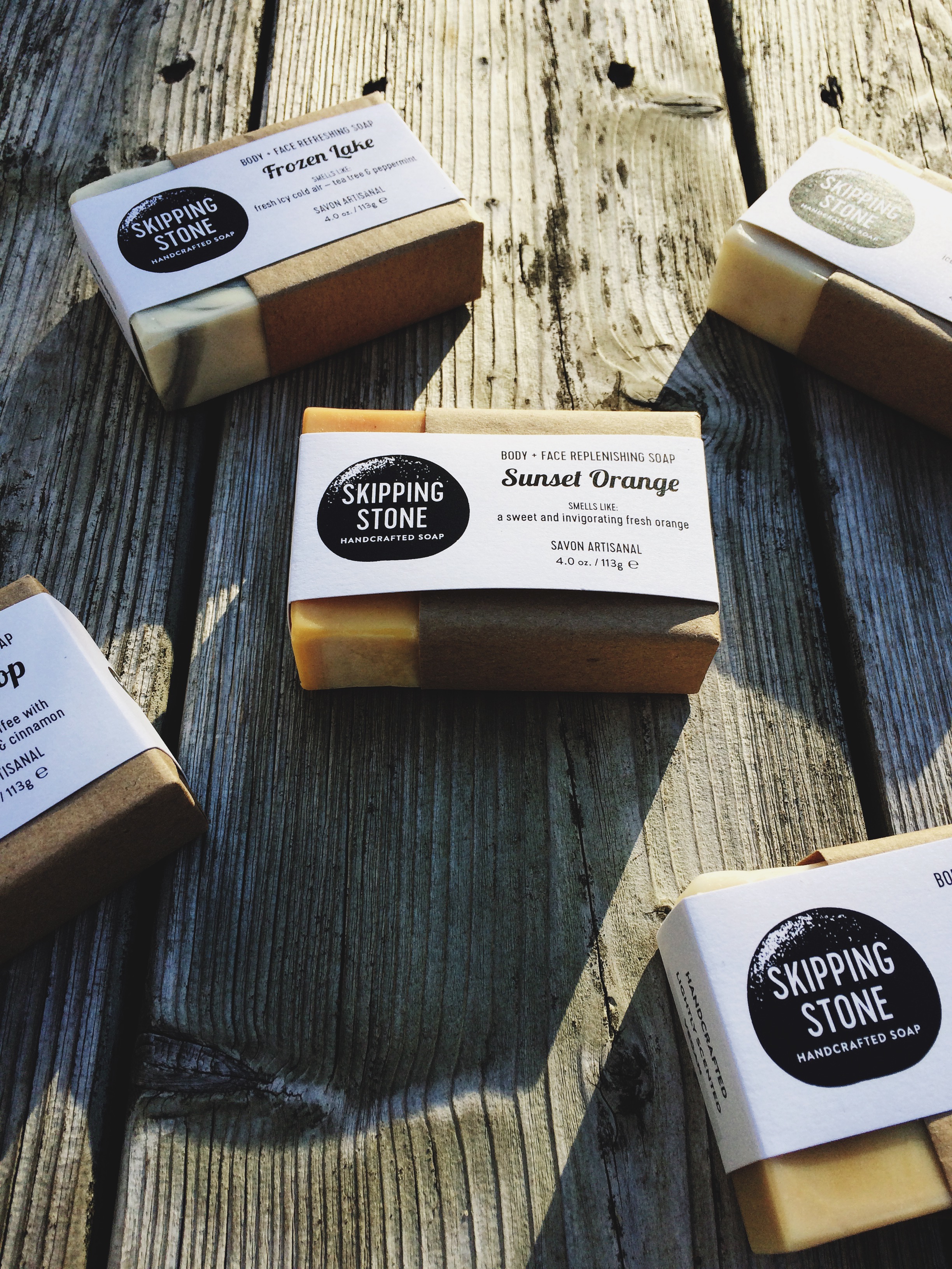 Seen here: Frozen Lake and Sunset Orange soap by Skipping Stone Soap .