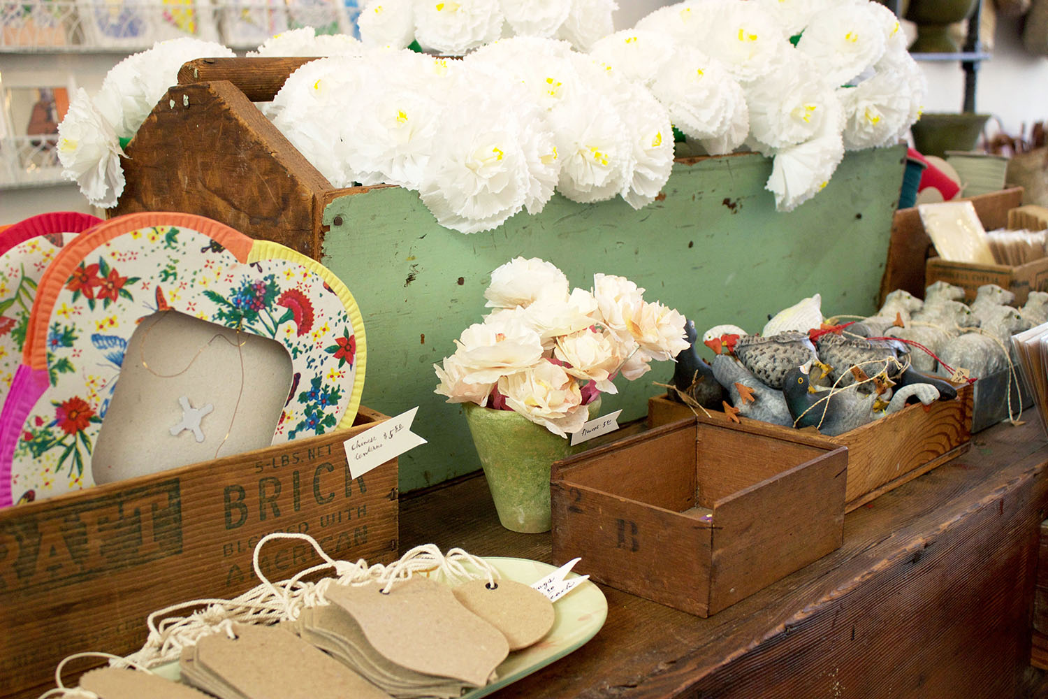 With a wide array of irresistible trinkets, like these paper lanterns and flowers, Bon has something for everyone.
