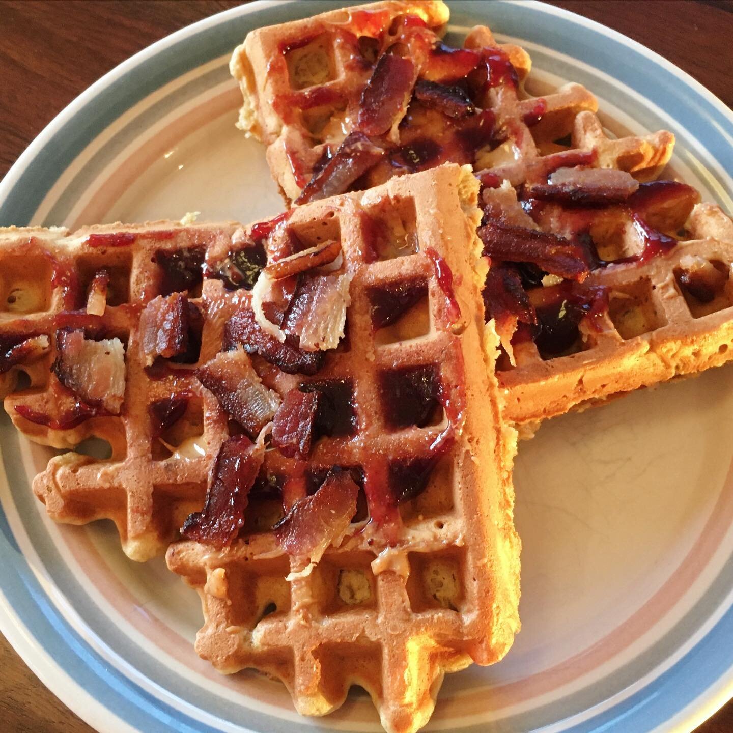 Not a good photo, but I celebrated #internationalwaffleday by making &ldquo;Elvis waffles&rdquo;. Banana &amp; peanut butter waffles topped with more peanut butter, blackberry jam, and bacon. King-worthy. 🍌 🥜 🥓 🧇 👑