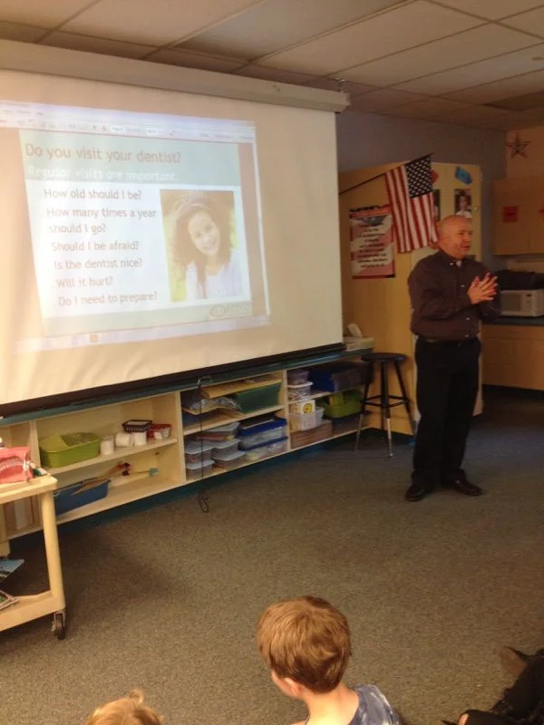 Dr. Couch loves to educate children about important dental habits. 