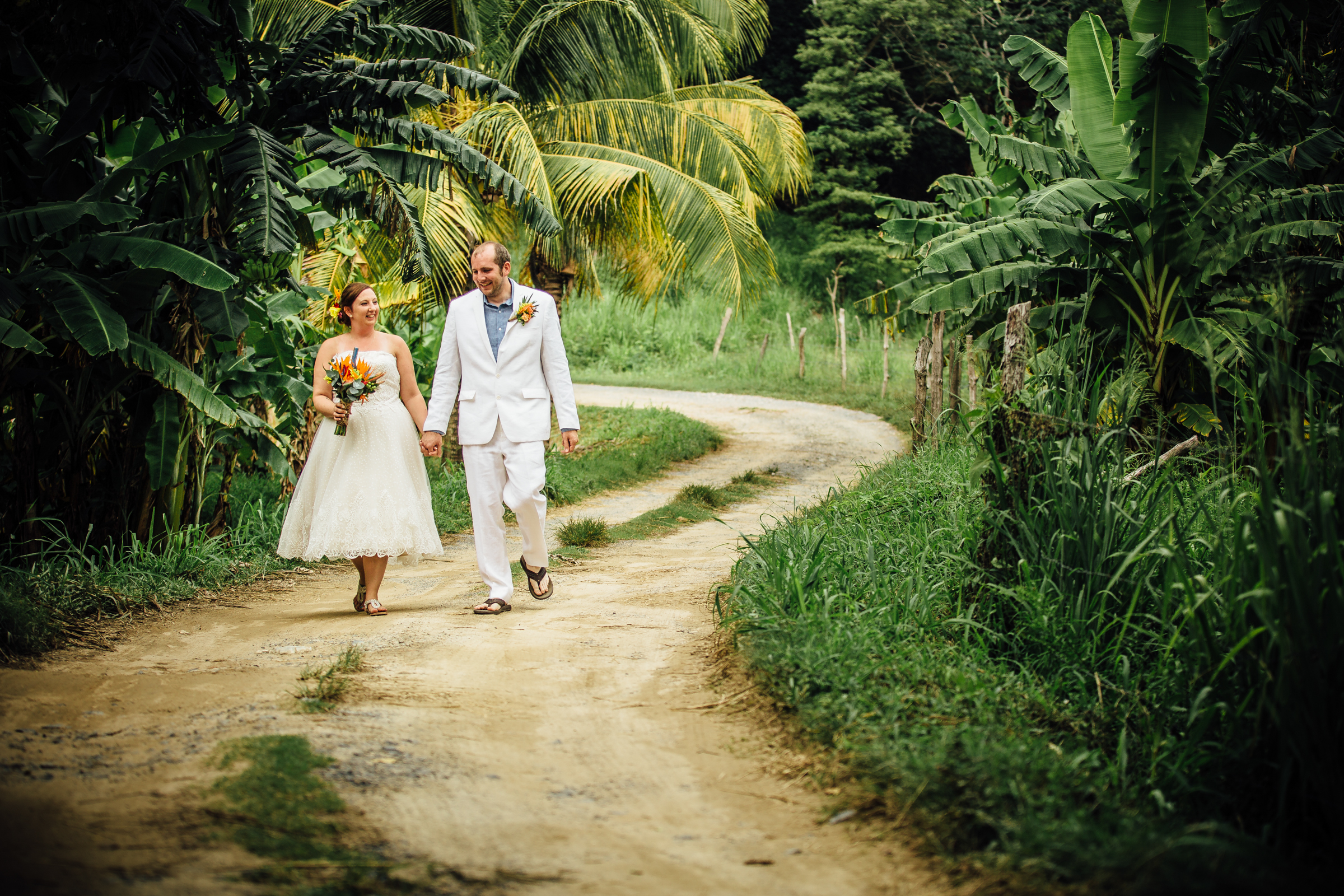 Roatán Honduras wedding, dirt road and palm trees