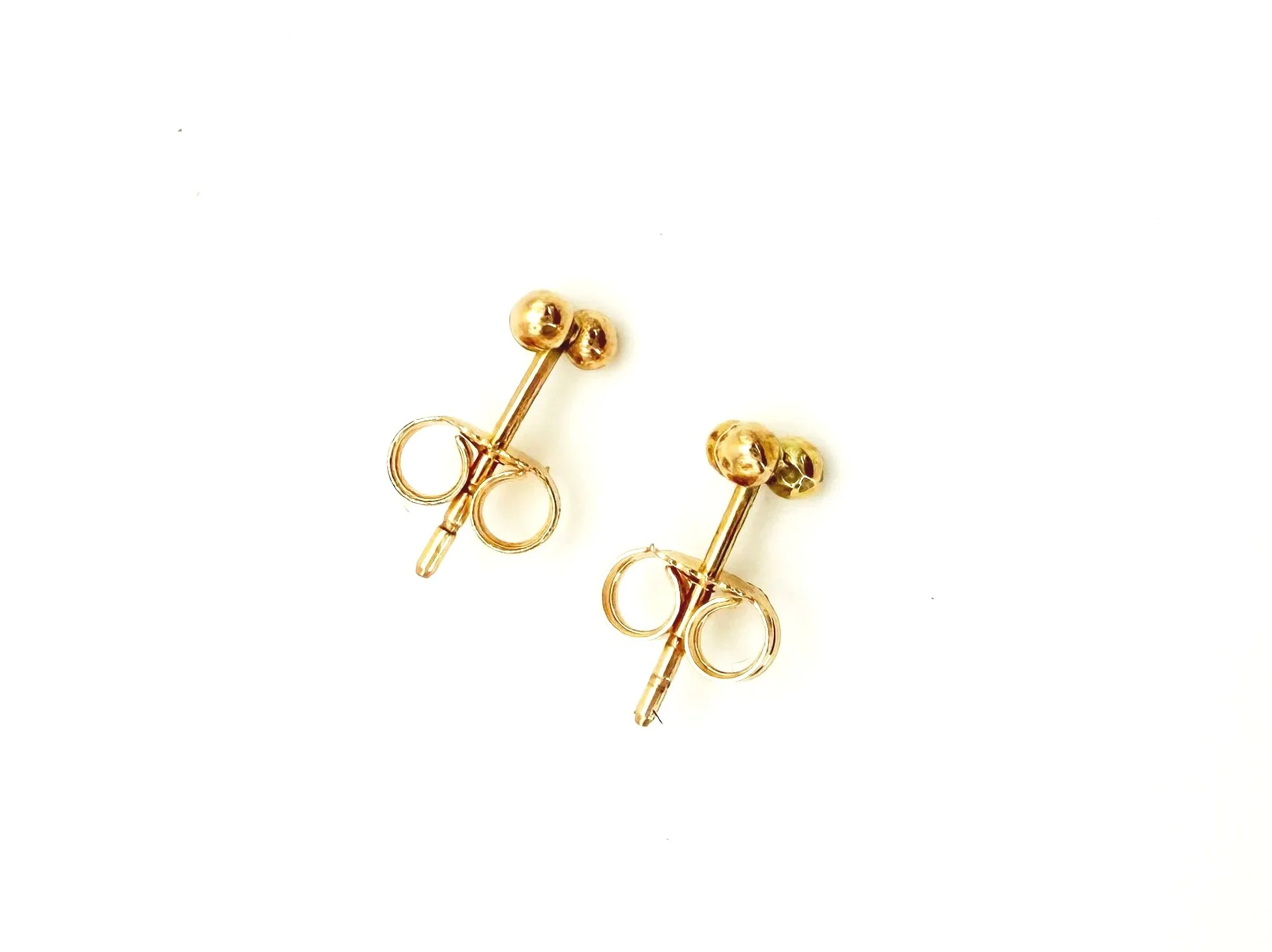 Tiny handmade gold studs with butterfly back