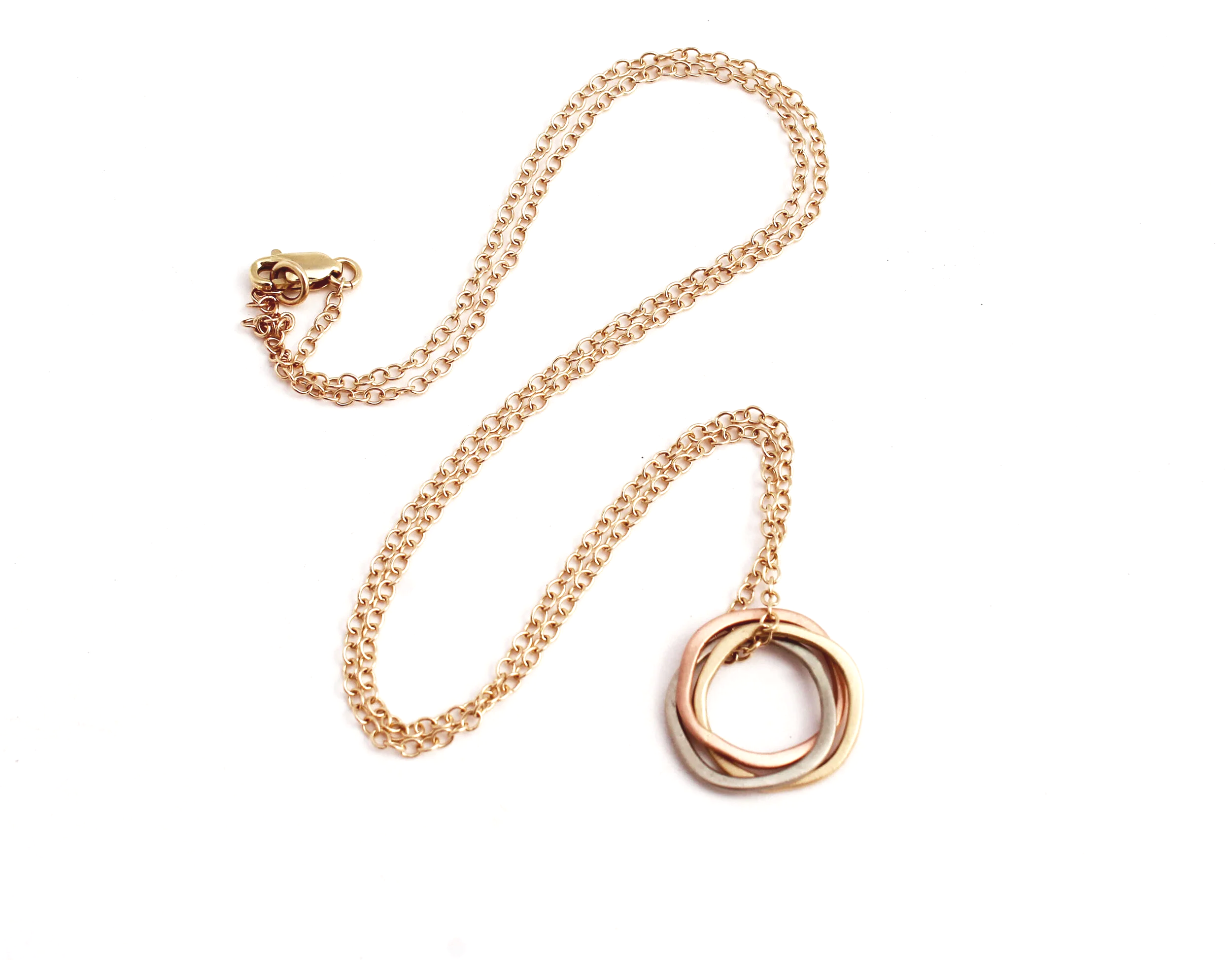 Rose gold, white gold and yellow gold circles pendant