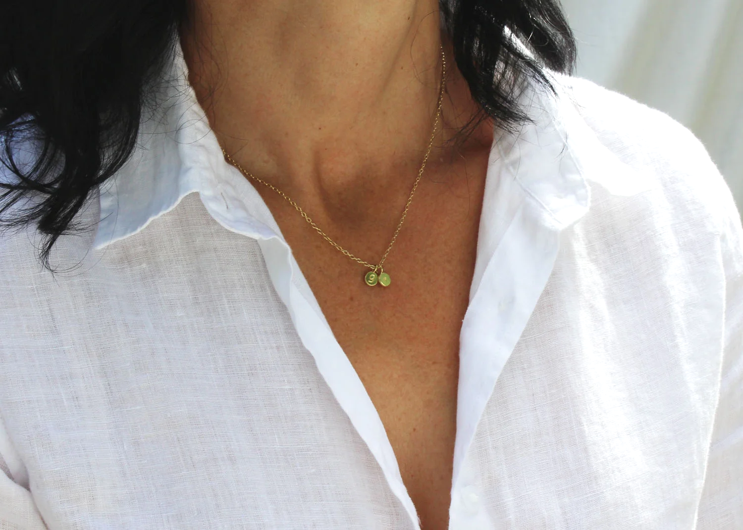 handmade artisan initial disc pendant in 18k gold with lower case stamped letters