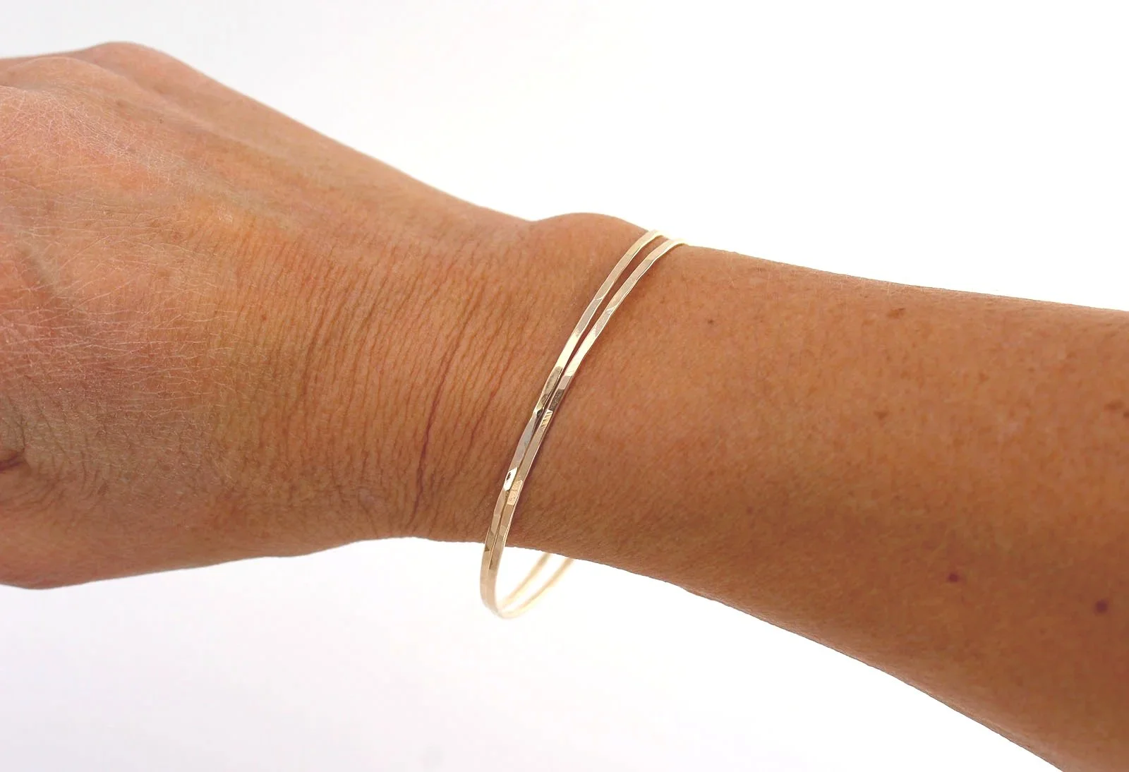 artisan made thin gold bangle bracelet hammered