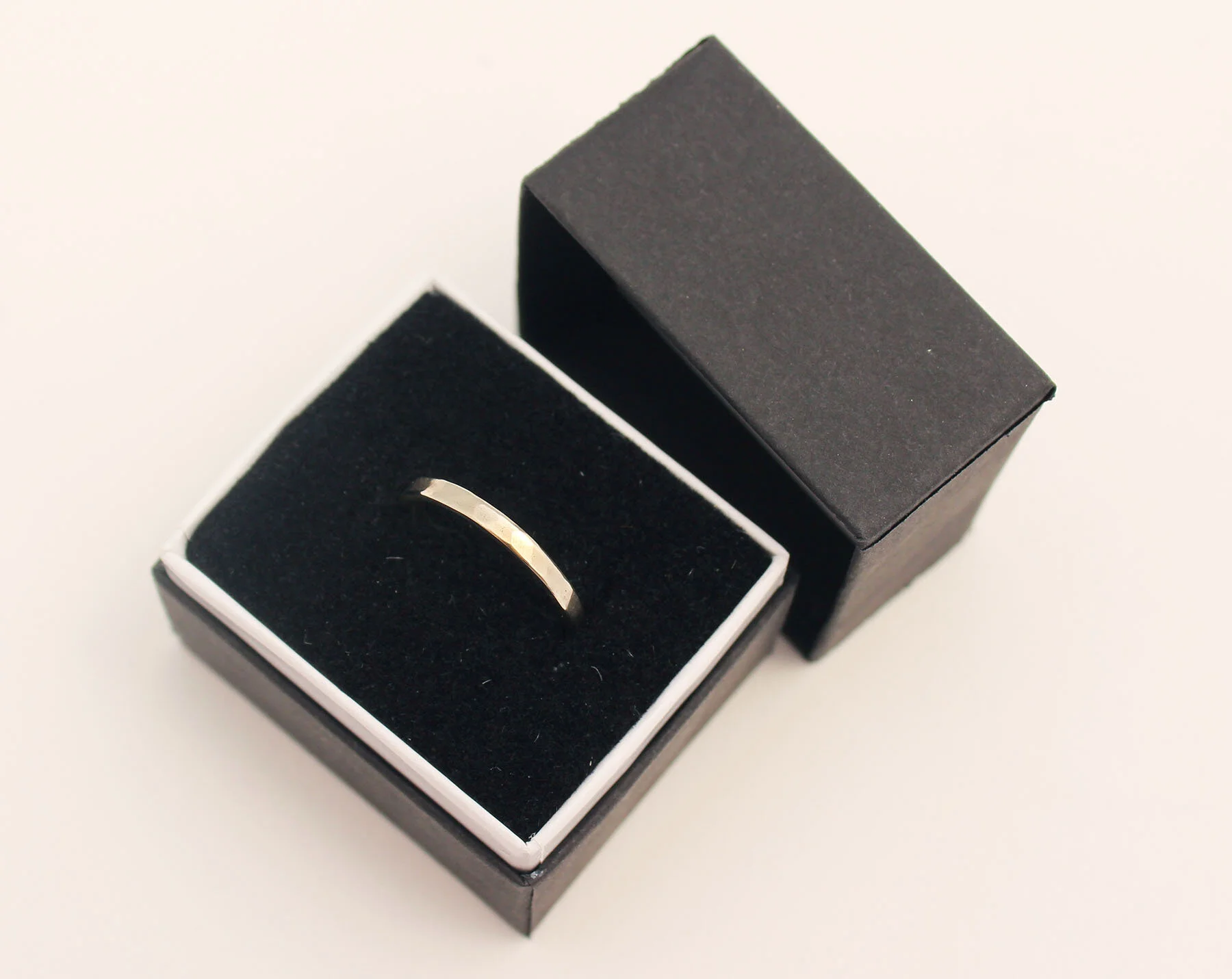 2mm white gold ring in box.jpg