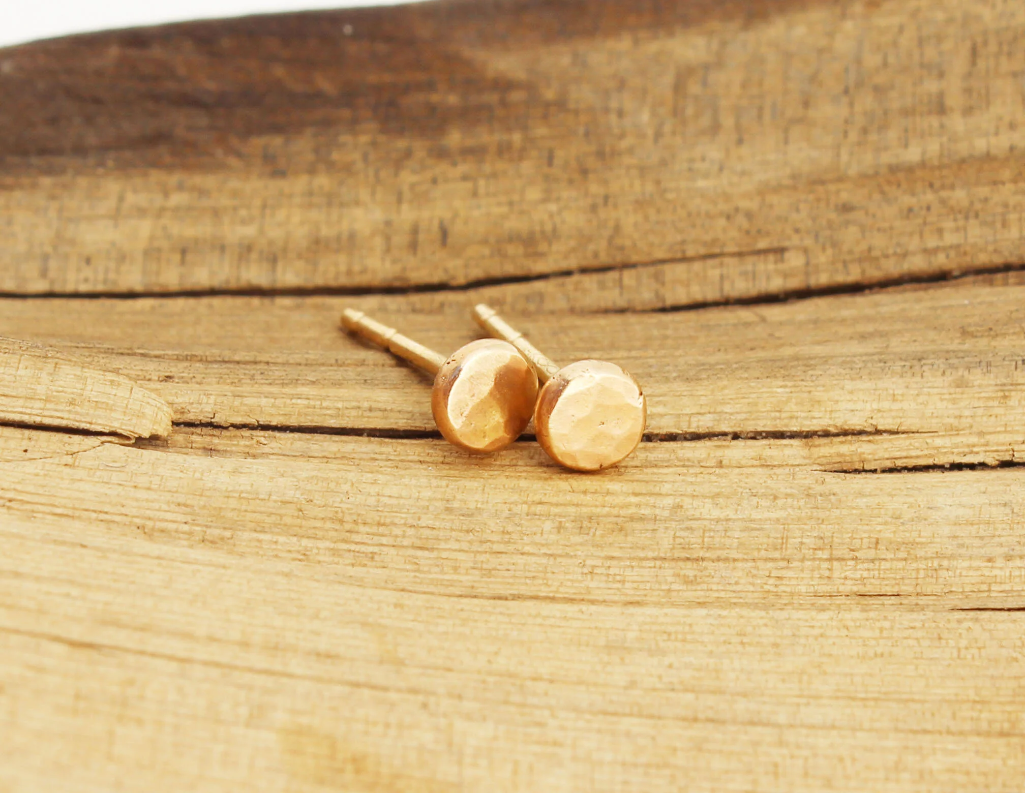 tiny gold studs.jpg